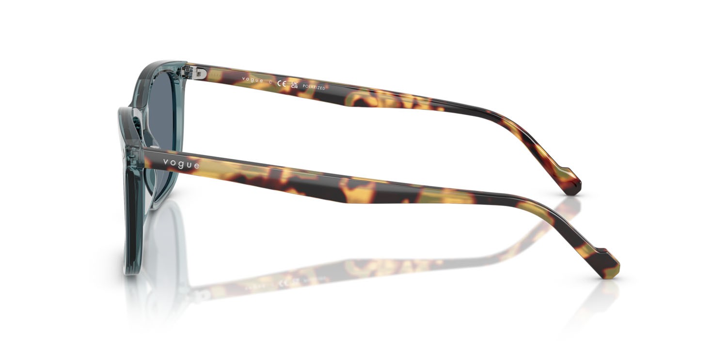 Occhiali da sole Vogue VO 5618S (32034Y) colore petrolio trasparente forma quadrato lenti polarizzata blu scuro