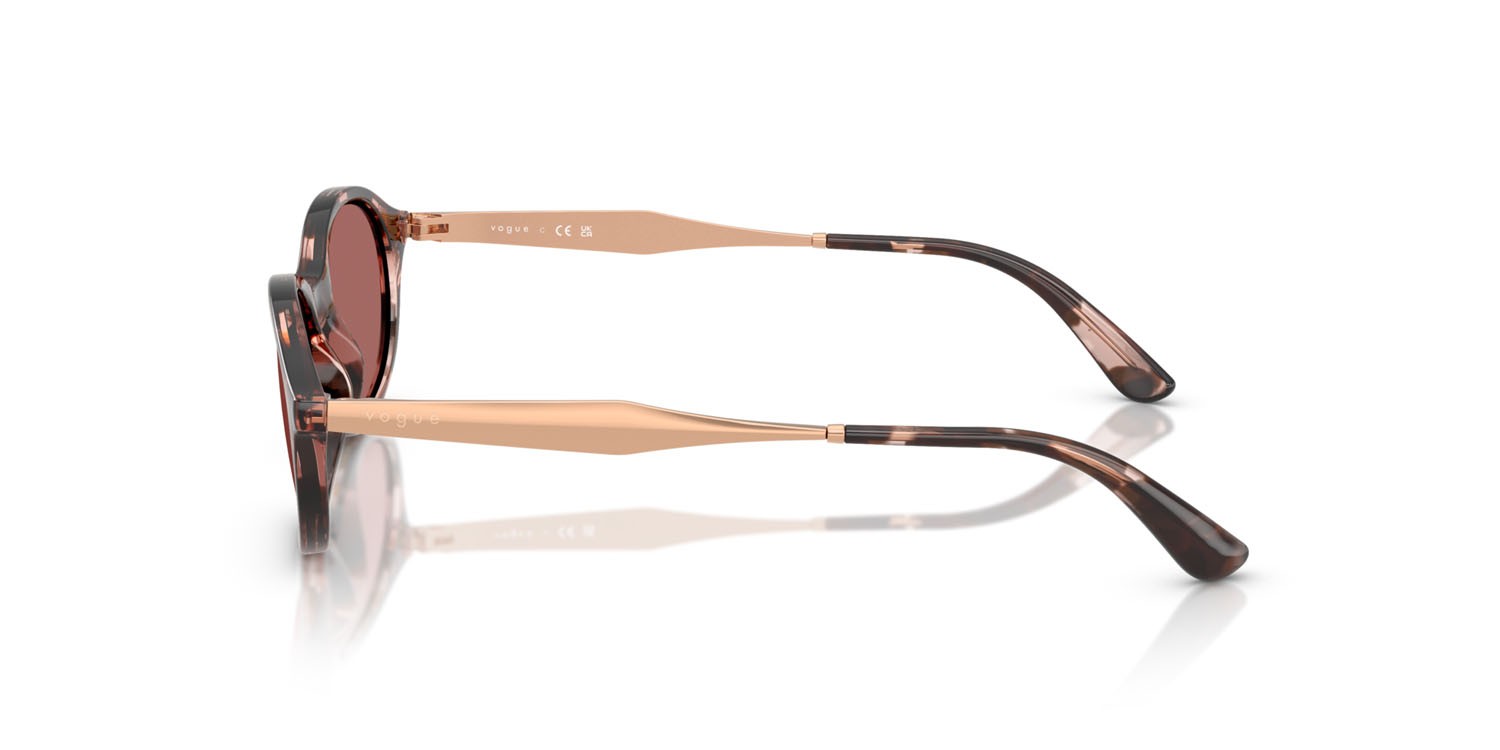 Occhiali da sole Vogue VO 5625S (319969) colore havana rosa forma ovale lenti violetto scuro