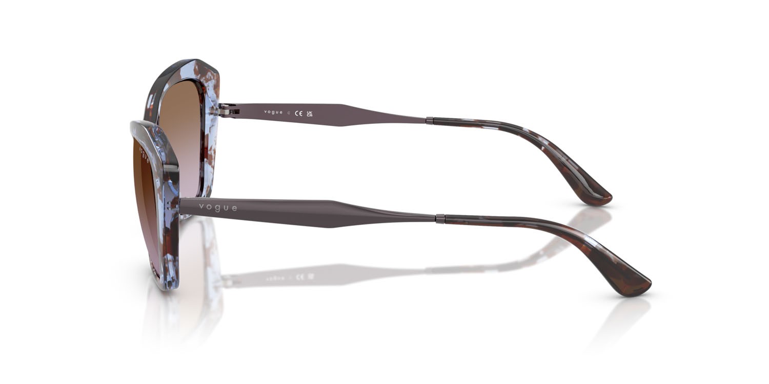 Occhiali da sole Vogue VO 5626S (320168) colore blu havana forma irregolare lenti violetto sfumato marrone