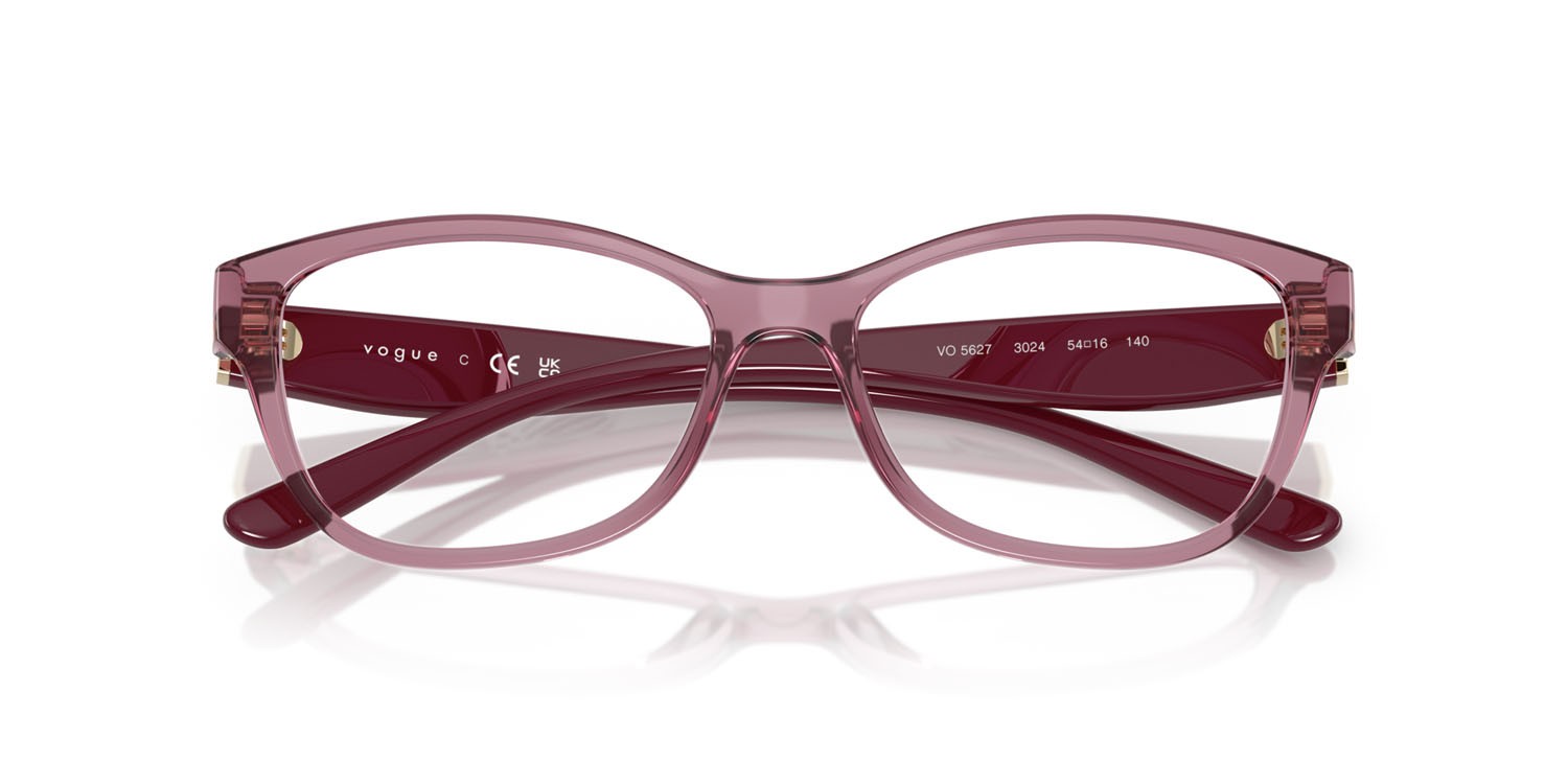 Eyeglasses Vogue VO 5627 (3024) color rosa scuro trasparente shape butterfly lenses lente demo