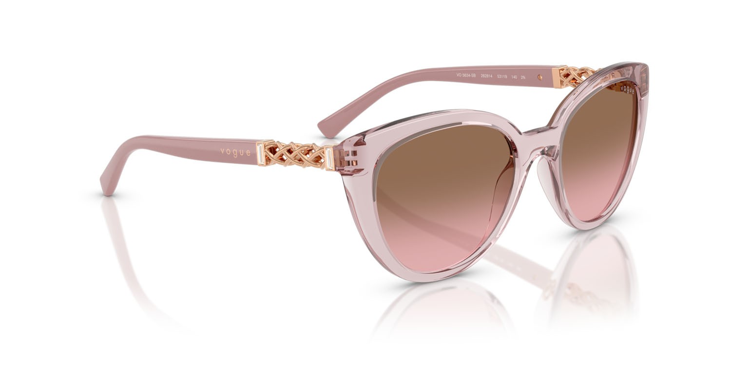 Sunglasses Vogue VO 5634SB (282814) color rosa trasparente shape cat eye lenses rosa sfumato marrone