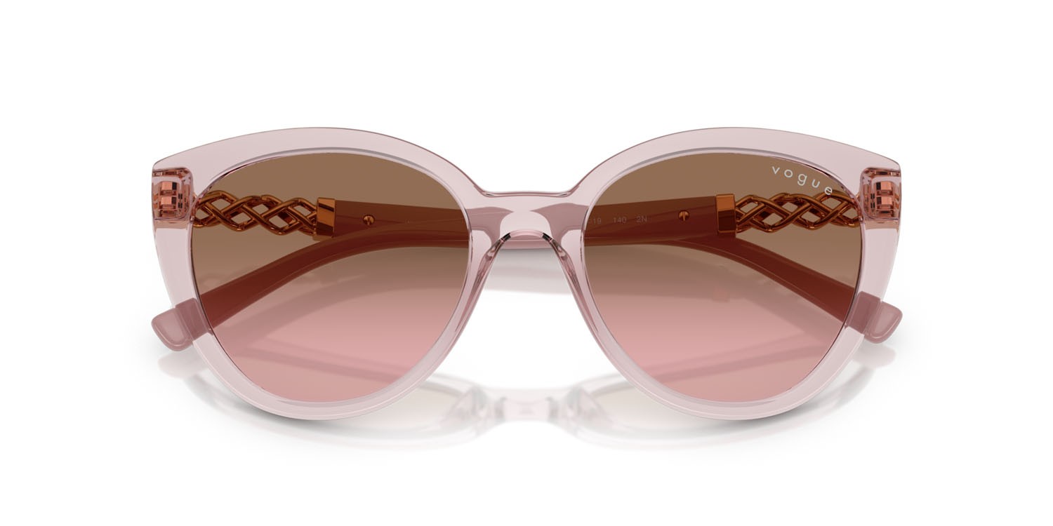 Sunglasses Vogue VO 5634SB (282814) color rosa trasparente shape cat eye lenses rosa sfumato marrone