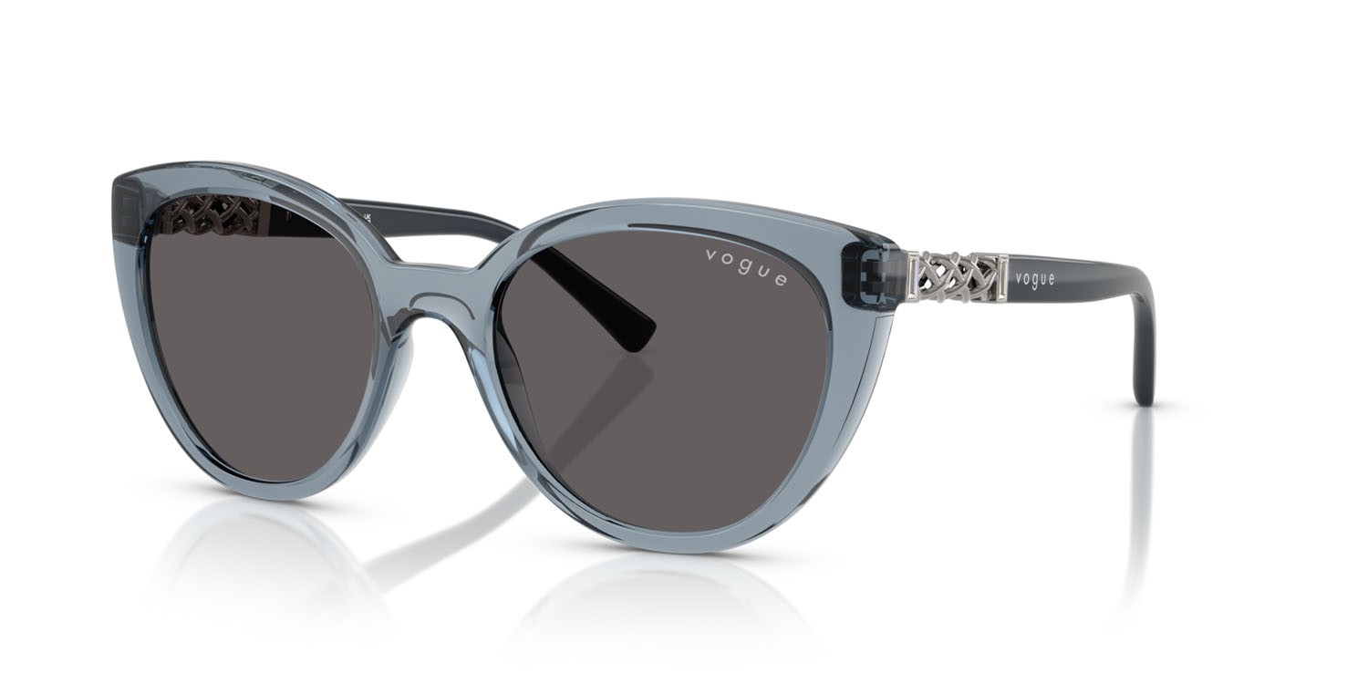 Occhiali da sole Vogue VO 5634SB (296687) colore azzurro trasparente forma cat eye lenti nero/grigio fumo
