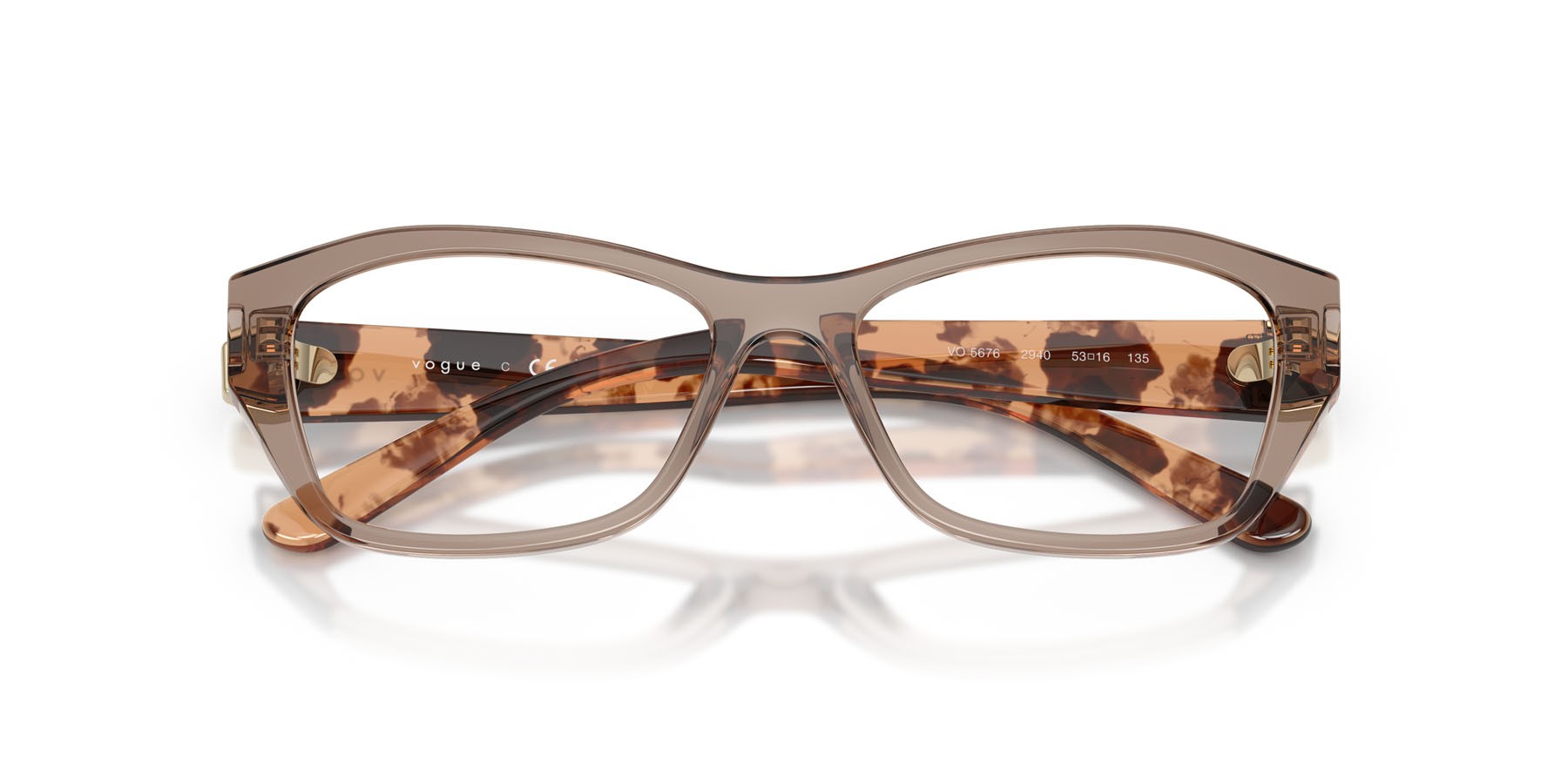 Eyeglasses Vogue VO 5676 (2940) color marrone trasparente shape irregular lenses lente demo