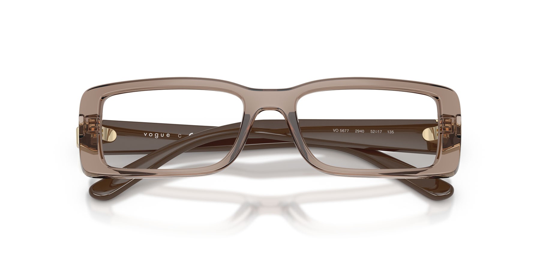 Eyeglasses Vogue VO 5677 (2940) color marrone trasparente shape rectangle lenses lente demo