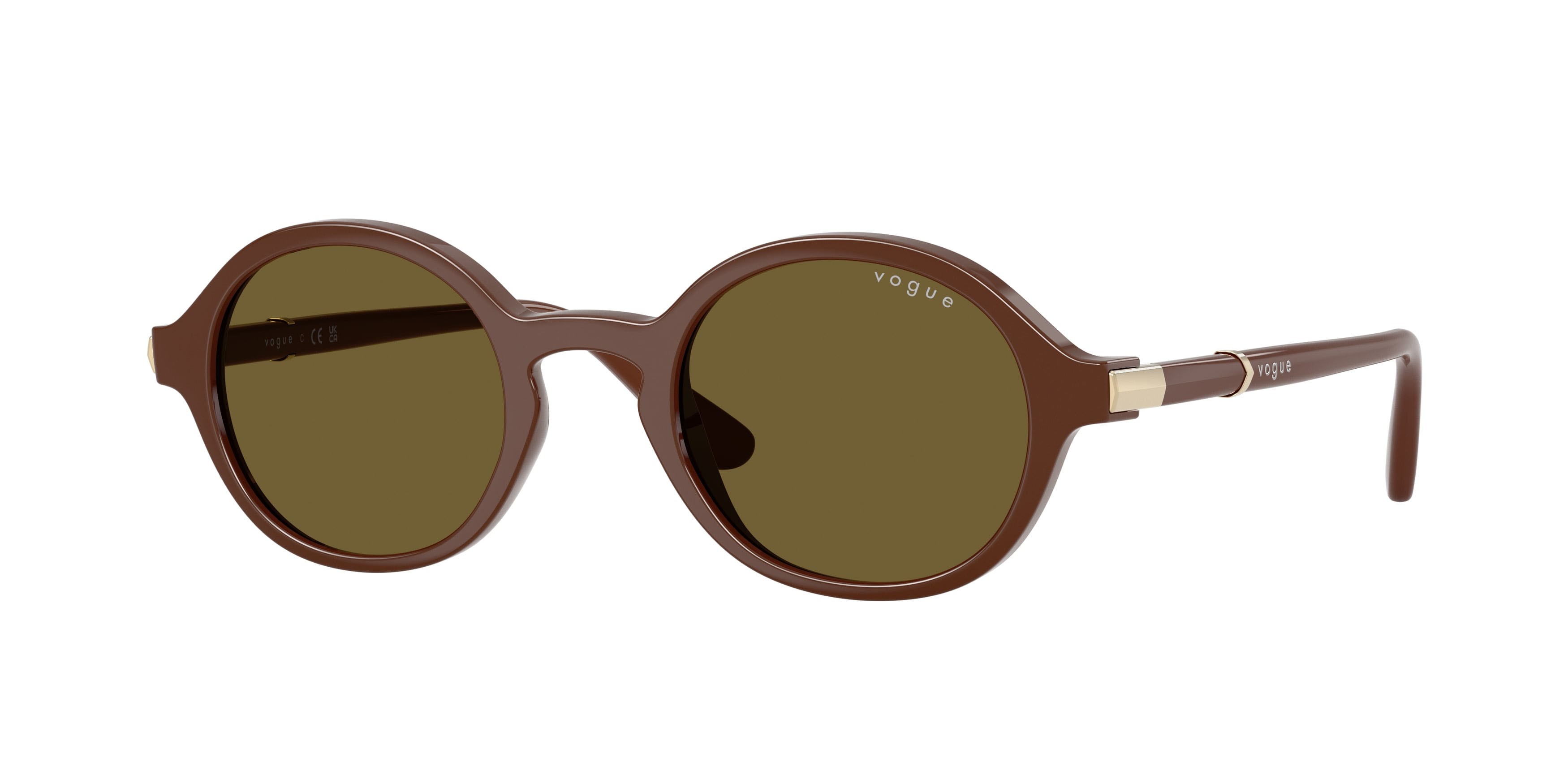 Occhiali da sole Vogue VO 5692S (329673) colore marrone pieno forma rotondo lenti marrone scuro