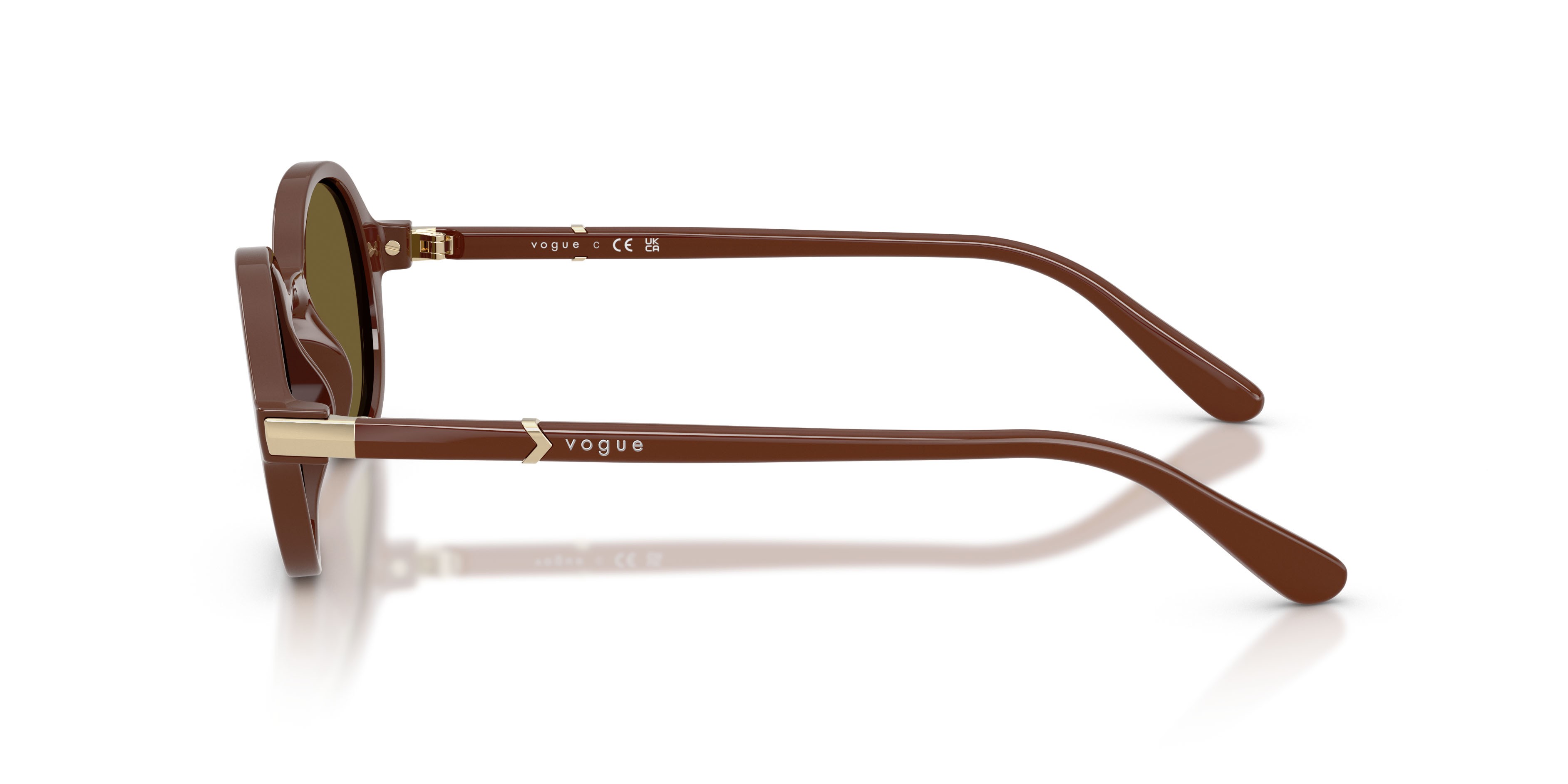 Occhiali da sole Vogue VO 5692S (329673) colore marrone pieno forma rotondo lenti marrone scuro