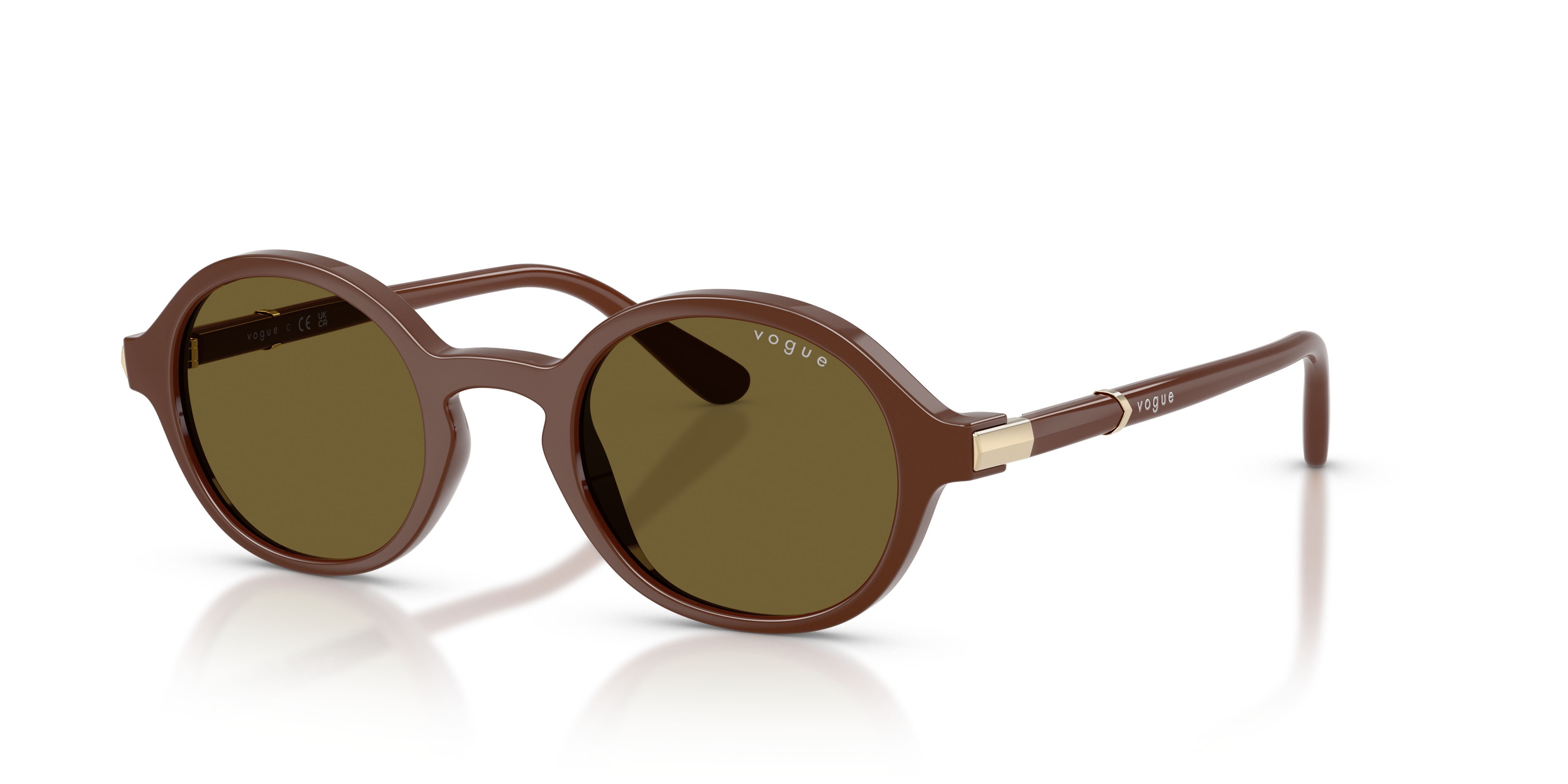 Occhiali da sole Vogue VO 5692S (329673) colore marrone pieno forma rotondo lenti marrone scuro