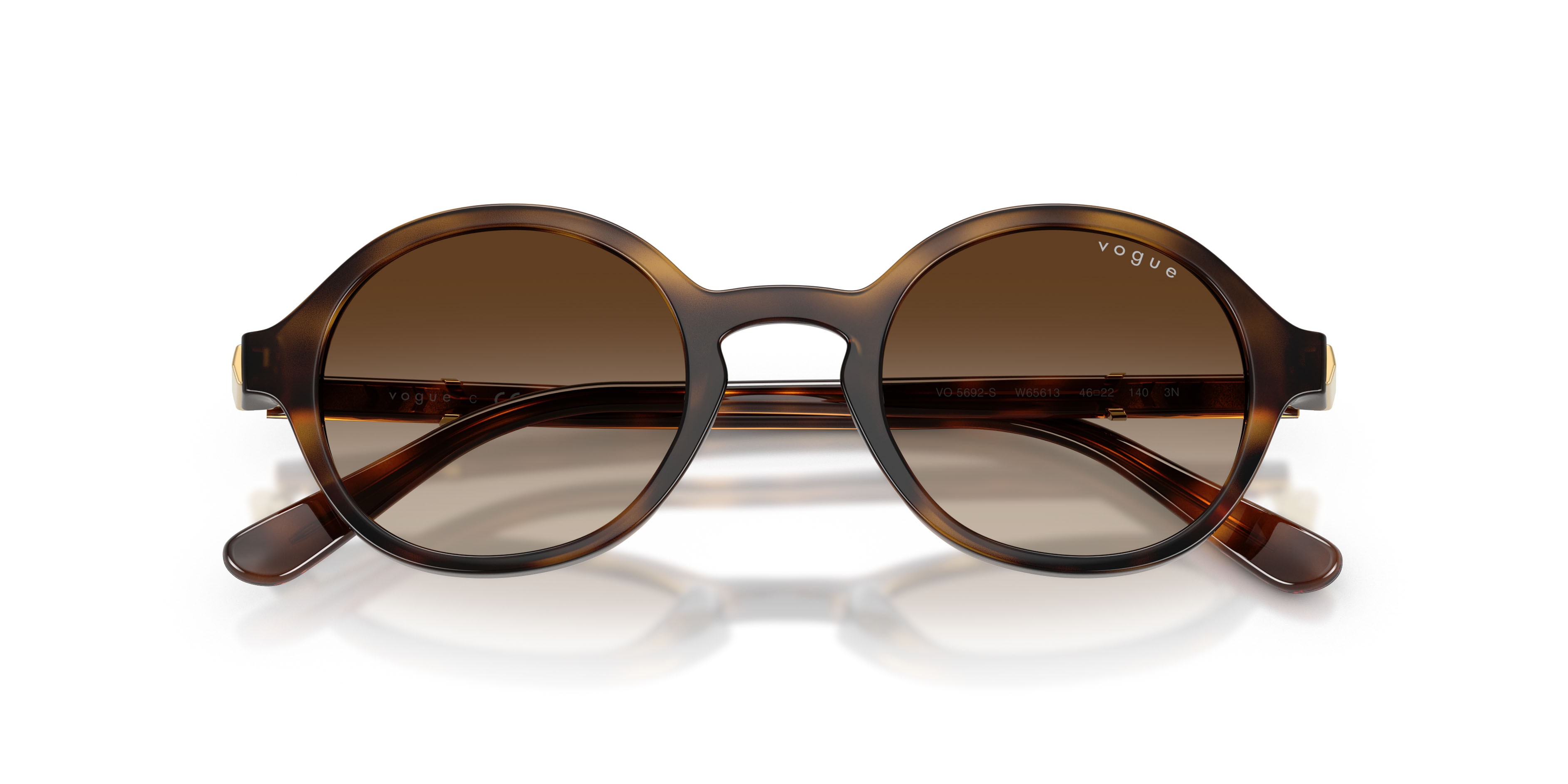 Occhiali da sole Vogue VO 5692S (W65613) colore havana scuro forma rotondo lenti marrone sfumato
