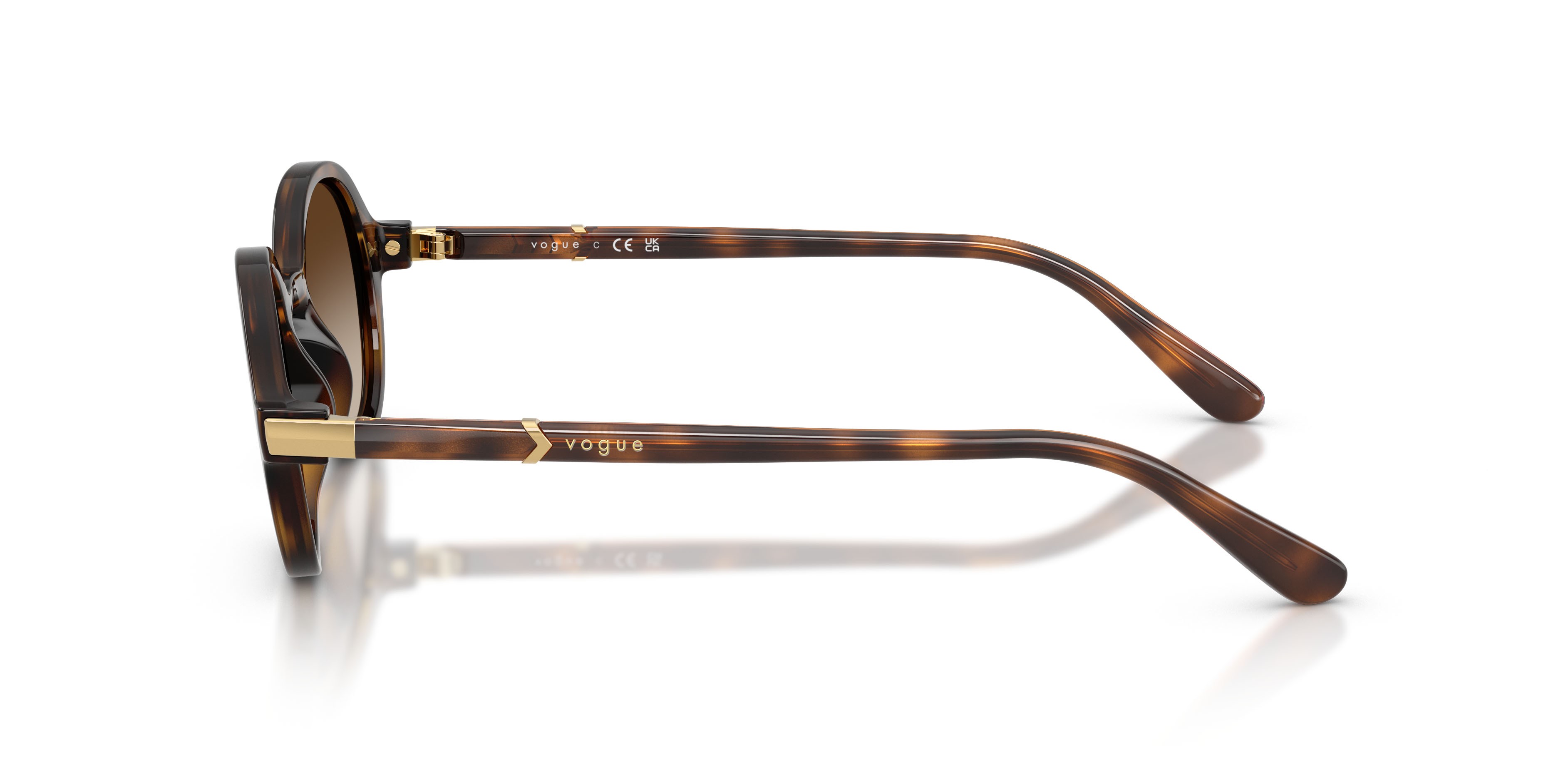 Occhiali da sole Vogue VO 5692S (W65613) colore havana scuro forma rotondo lenti marrone sfumato