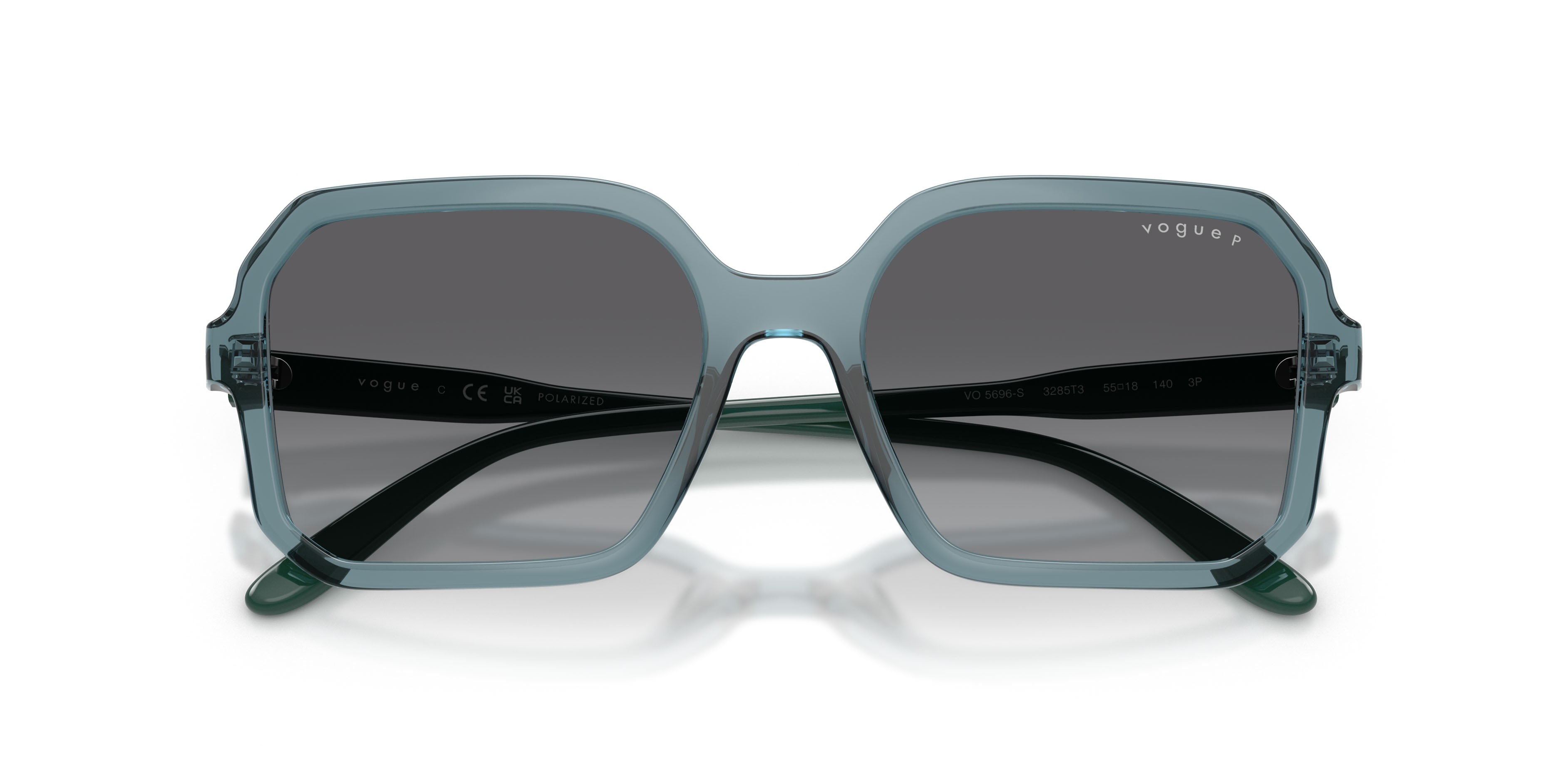 Sunglasses Vogue VO 5696S (3285T3) color azzurro trasparente shape square lenses grigio sfumato polarizzata