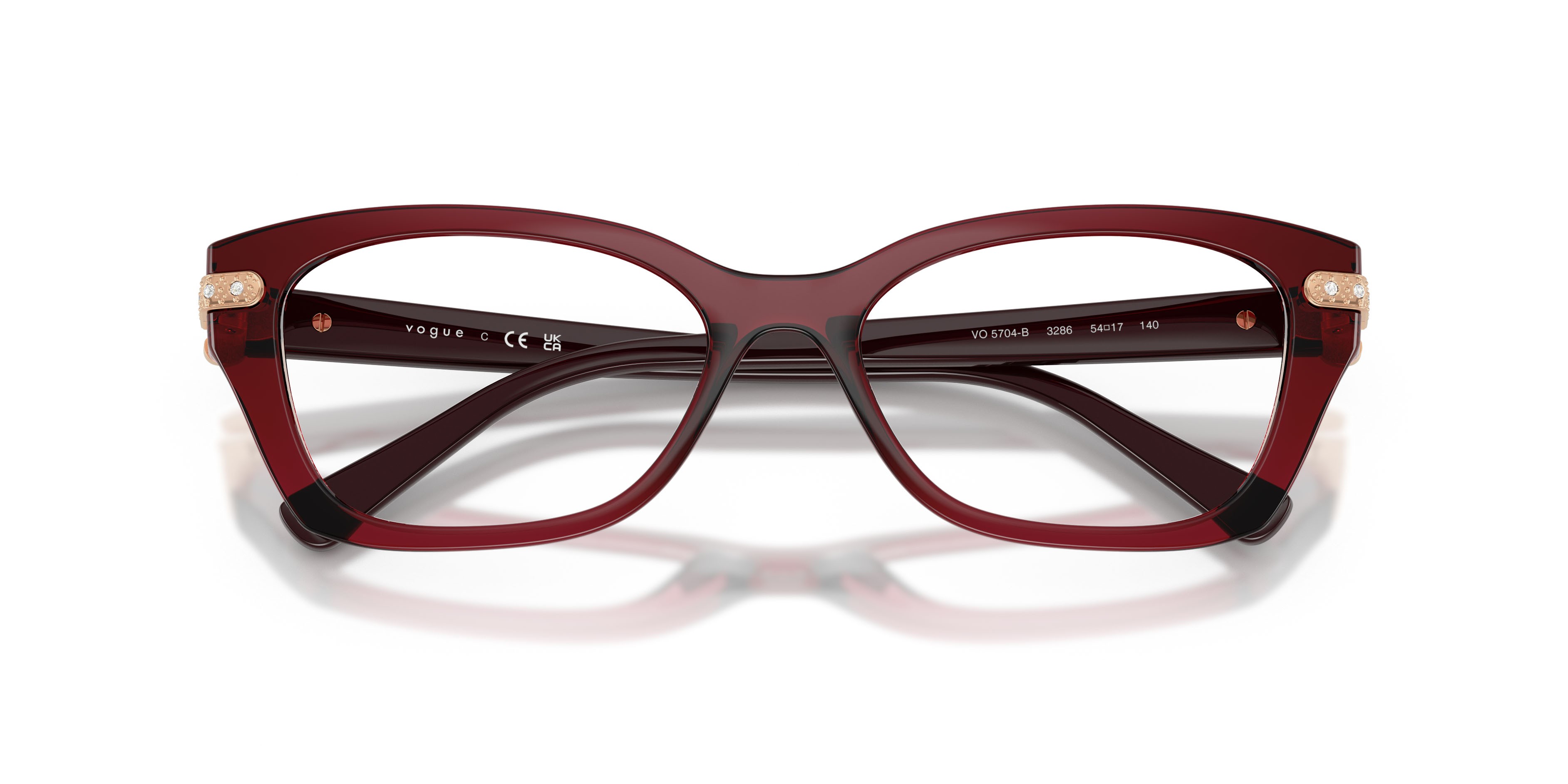 Eyeglasses Vogue VO 5704B (3286) color bordeaux trasparente shape cat eye lenses lente demo
