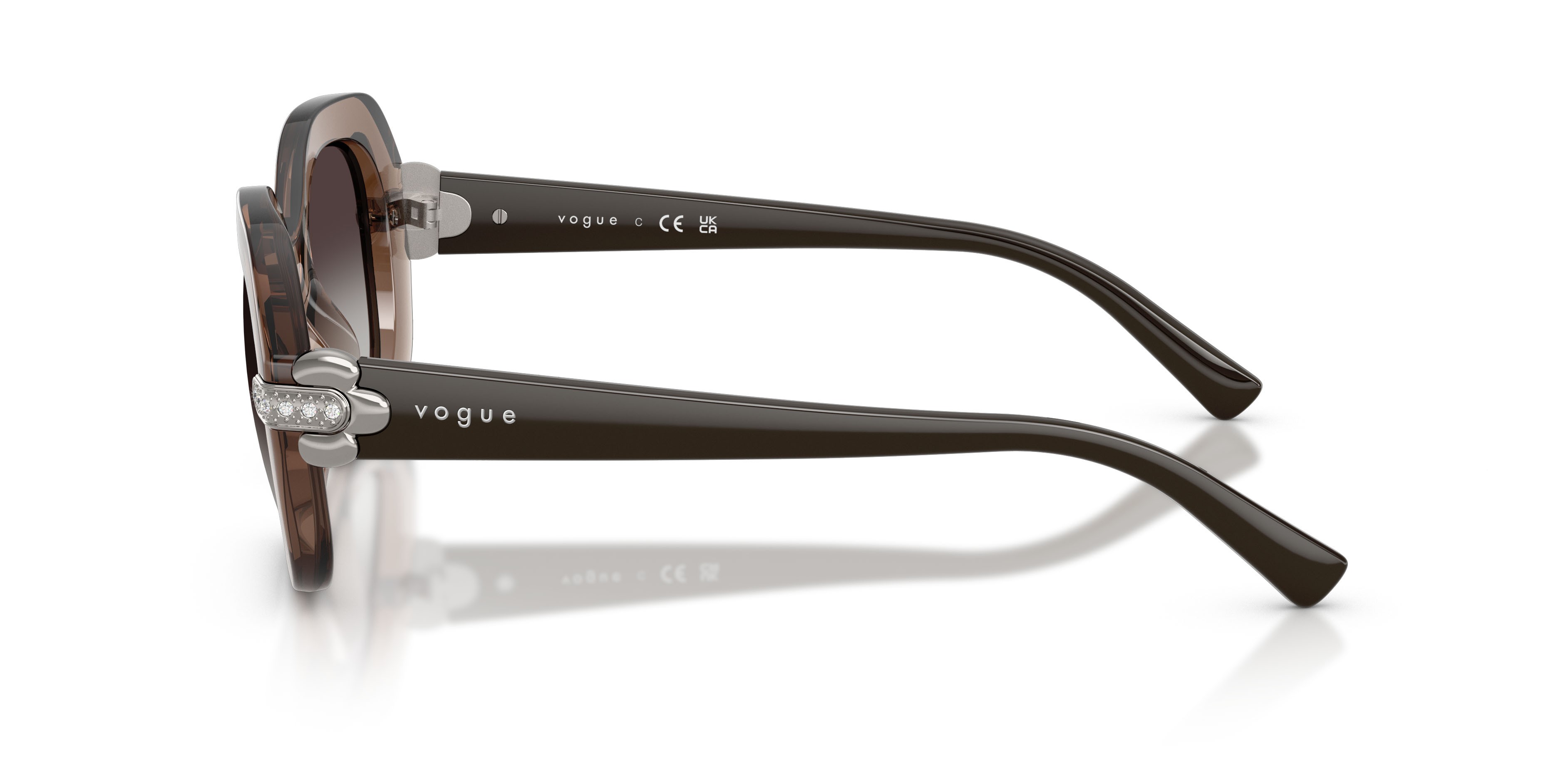 Occhiali da sole Vogue VO 5706SB (29408G) colore marrone trasparente forma irregolare lenti sfumato grigio