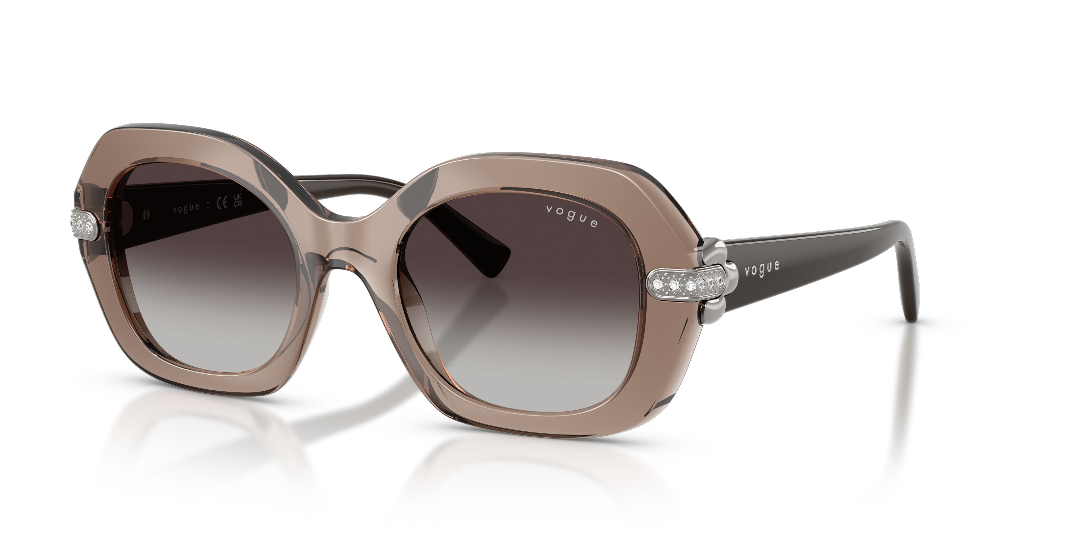 Occhiali da sole Vogue VO 5706SB (29408G) colore marrone trasparente forma irregolare lenti sfumato grigio