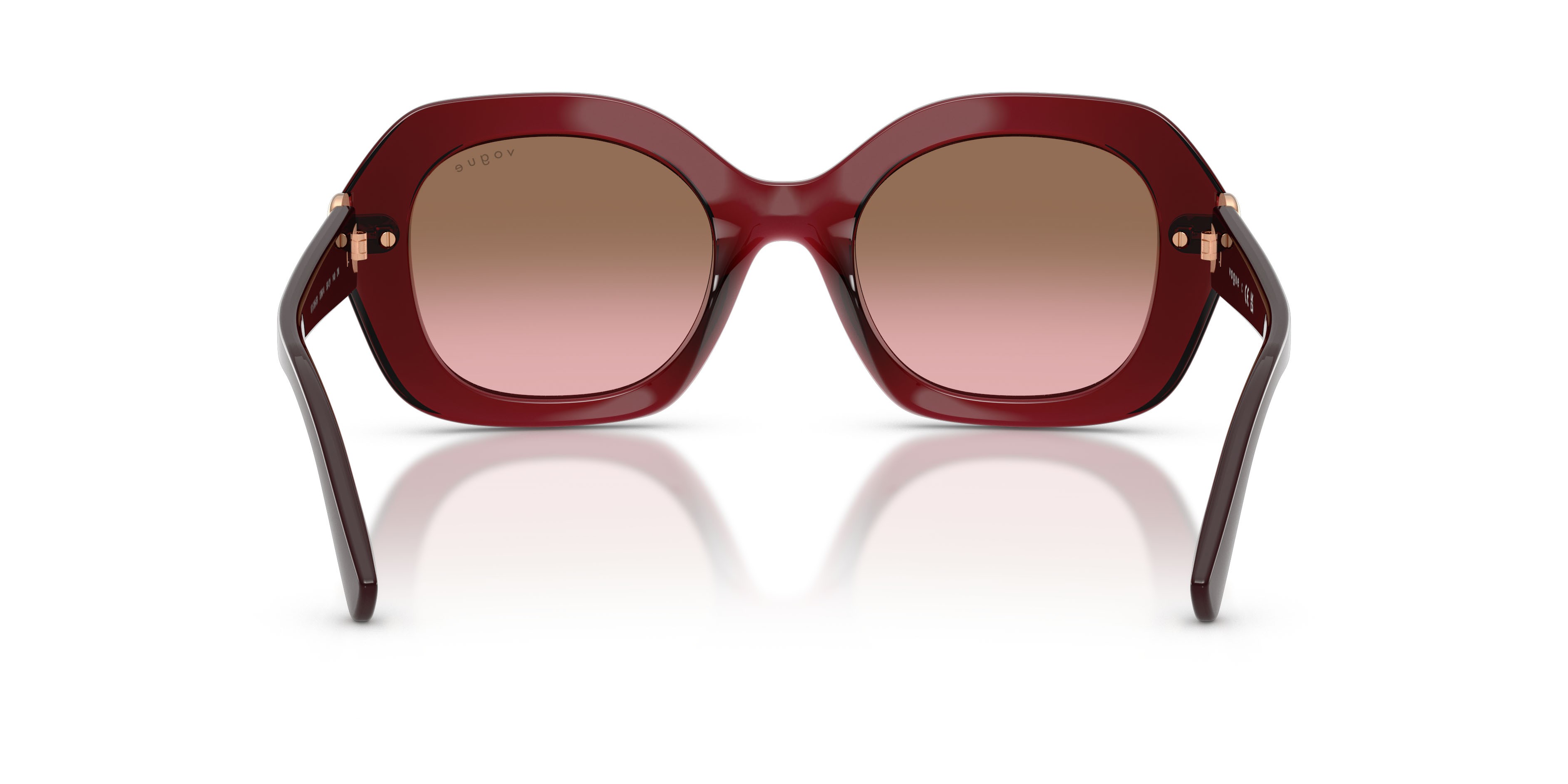 Occhiali da sole Vogue VO 5706SB (328614) colore bordeaux trasparente forma irregolare lenti rosa sfumato marrone