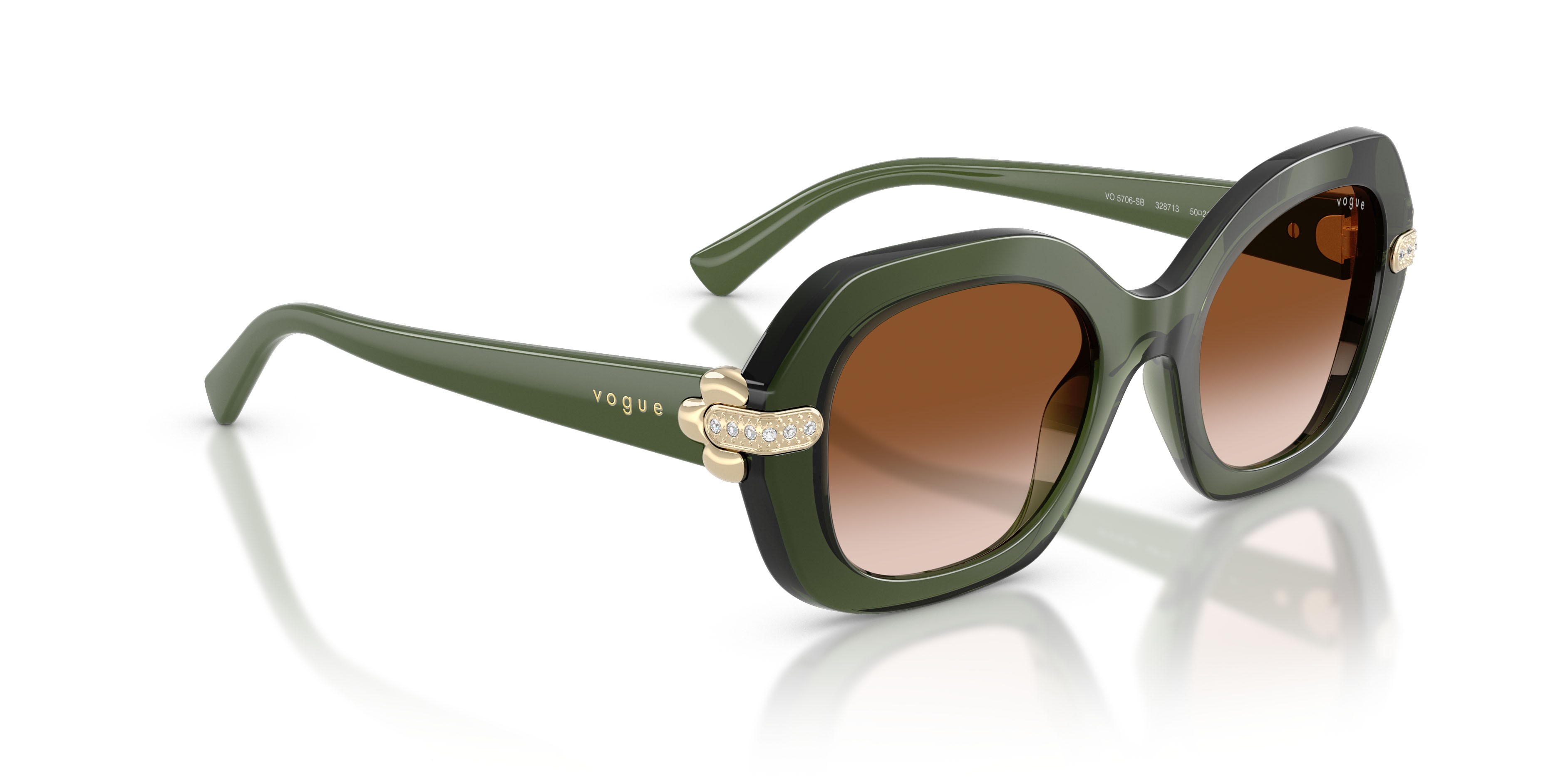 Occhiali da sole Vogue VO 5706SB (328713) colore verde trasparente forma irregolare lenti marrone sfumato