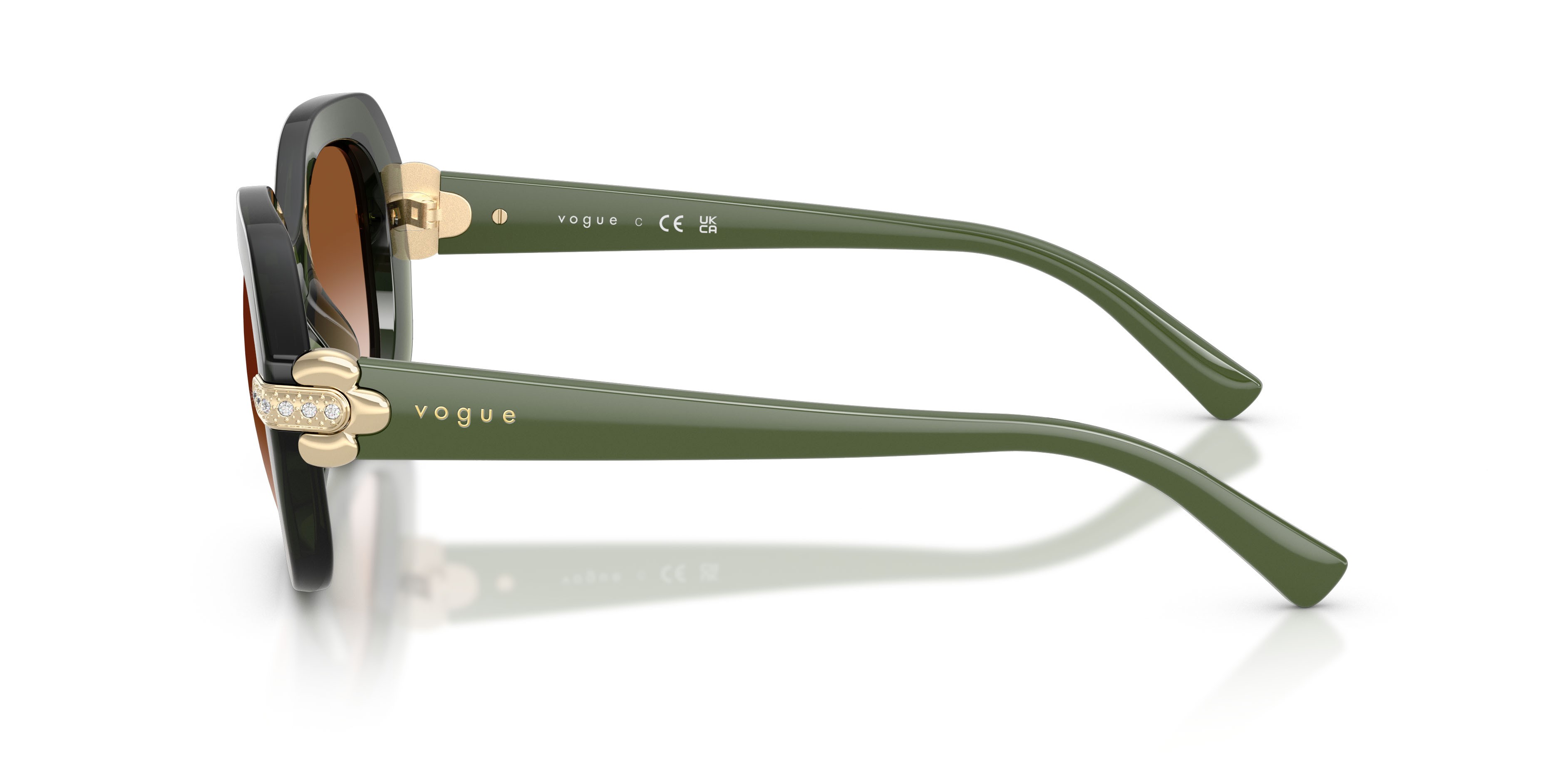 Occhiali da sole Vogue VO 5706SB (328713) colore verde trasparente forma irregolare lenti marrone sfumato