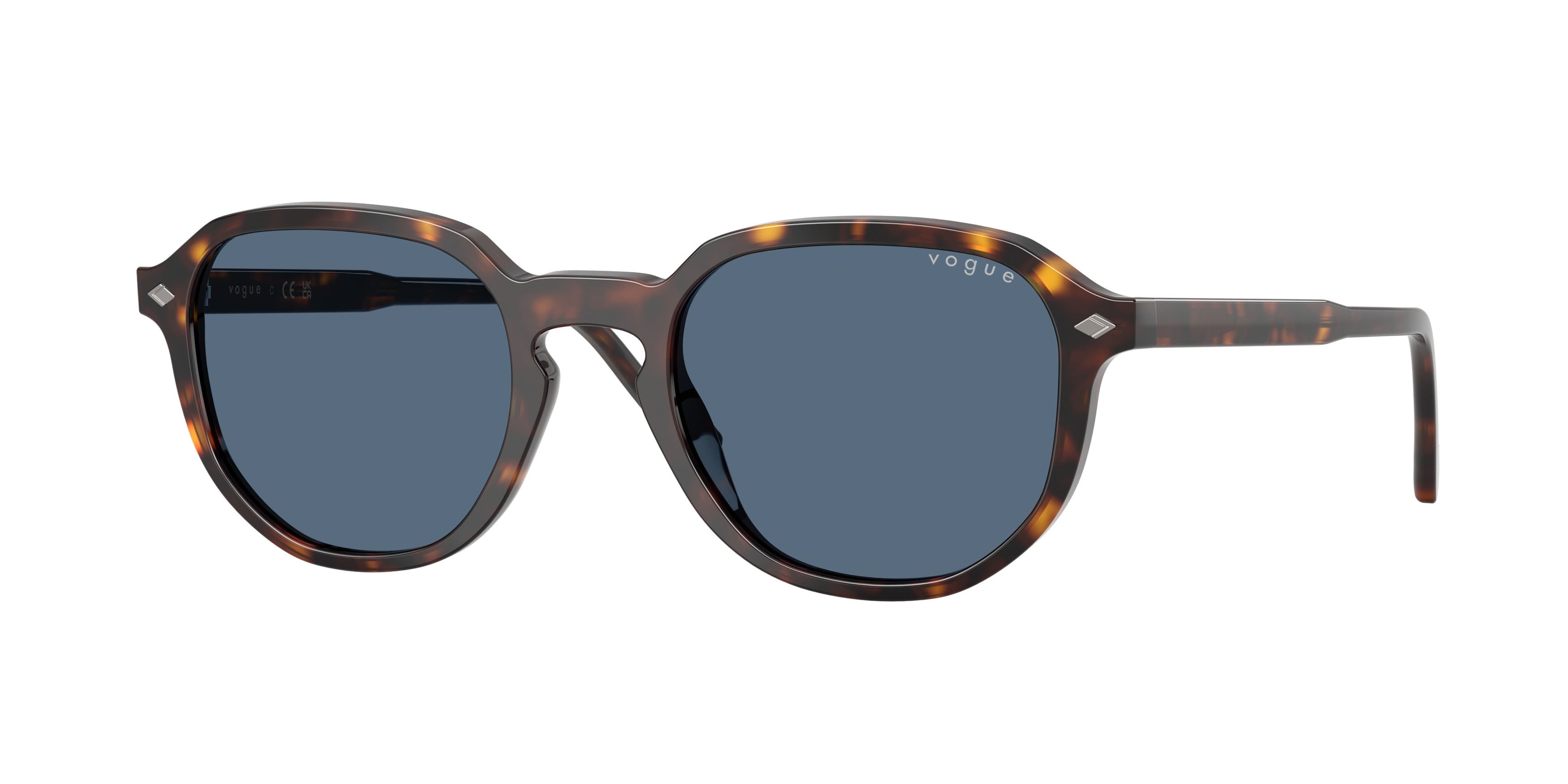 Occhiali da sole Vogue VO 5707S (W65680) colore havana scuro forma irregolare lenti blu scuro
