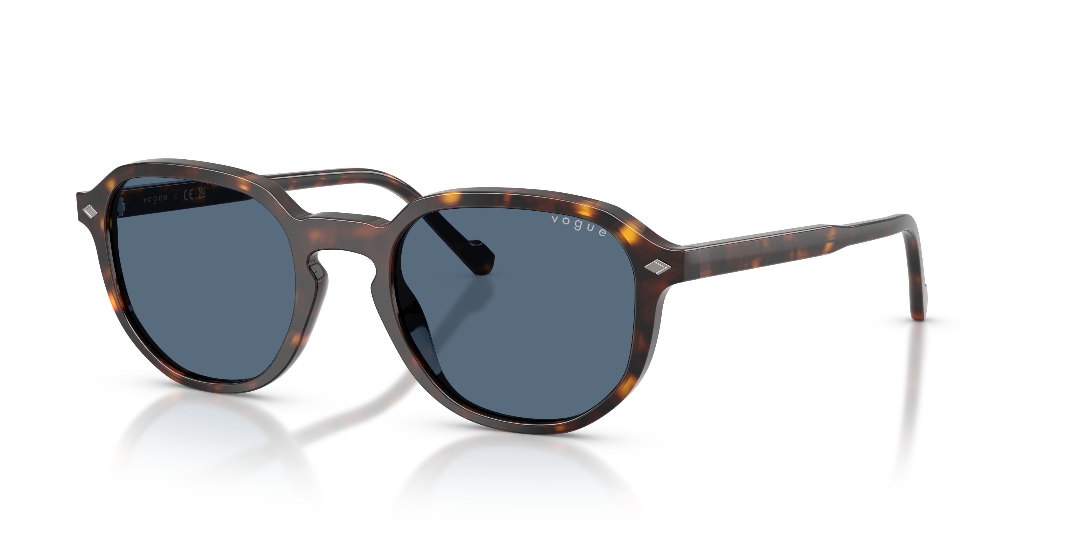 Occhiali da sole Vogue VO 5707S (W65680) colore havana scuro forma irregolare lenti blu scuro