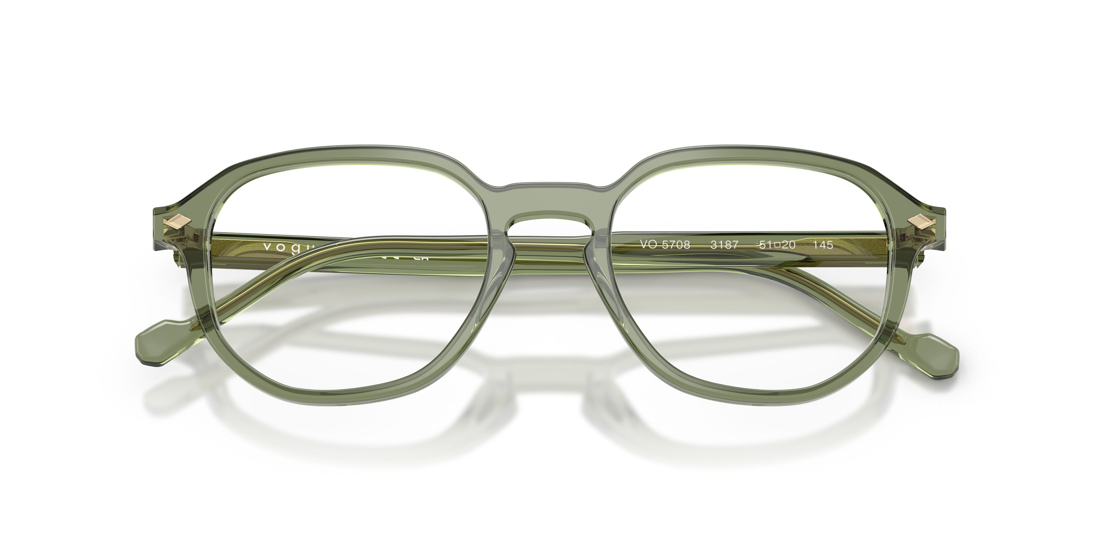 Eyeglasses Vogue VO 5708 (3187) color verde trasparente shape irregular lenses lente demo