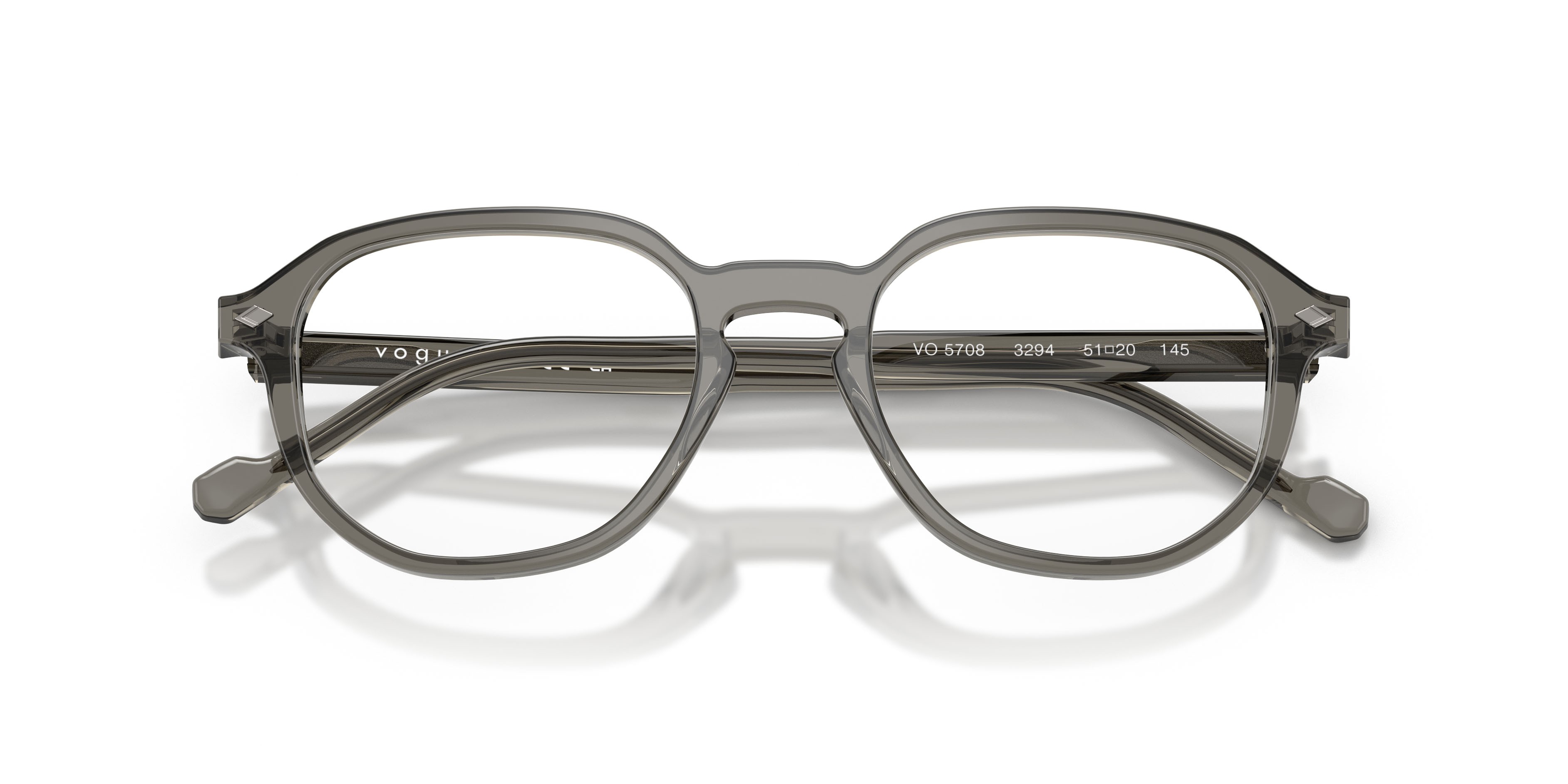 Eyeglasses Vogue VO 5708 (3294) color grigio scuro trasparente shape irregular lenses lente demo