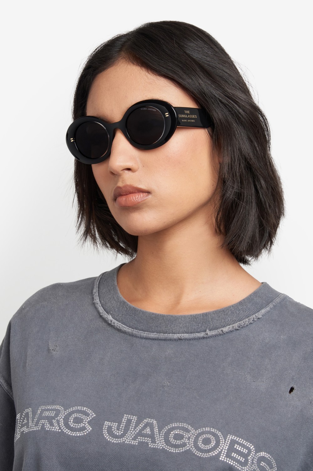 Occhiali da sole Marc Jacobs 799/S 207987 MNG IR colore crystal black forma rotondo lenti grey