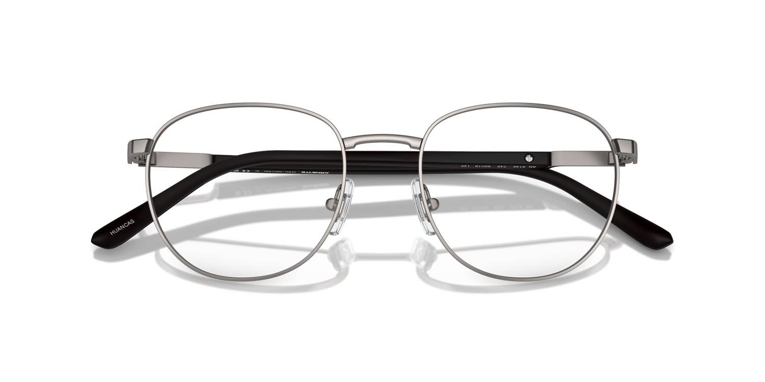 Eyeglasses Arnette Huancas AN 6142 (745) color gunmetal opaco shape pantos lenses trasparente