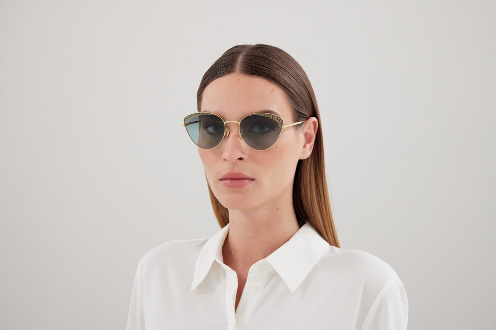 Occhiali da sole Boucheron BC0135S-002 colore oro forma cat eye lenti verde