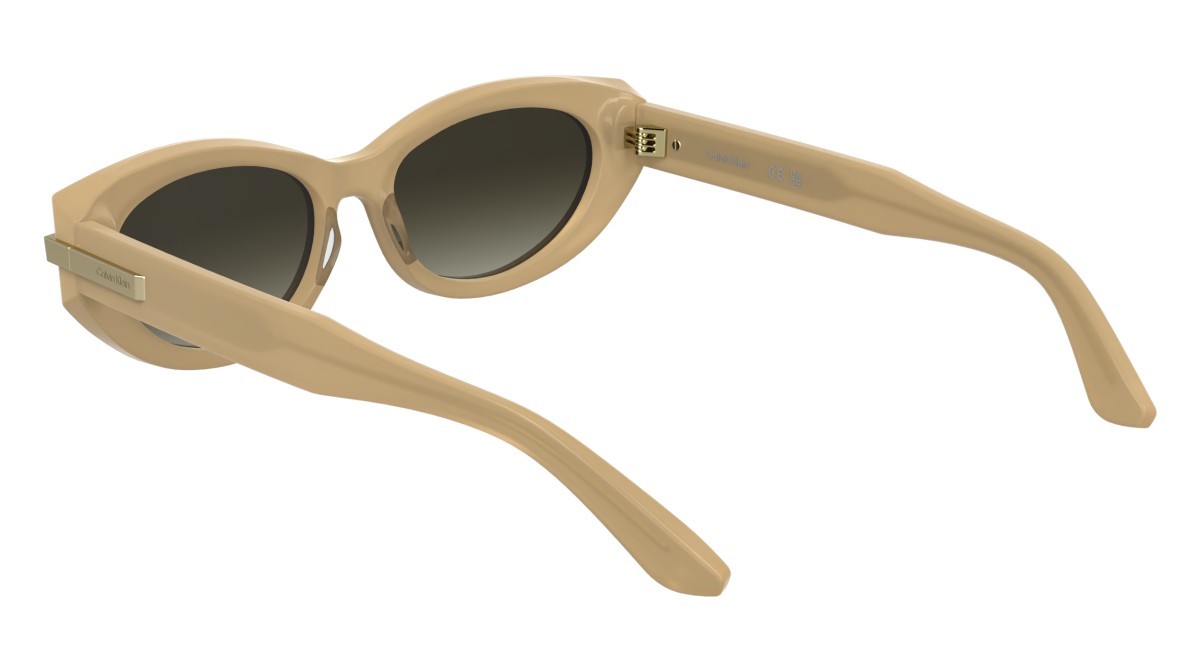 Sunglasses Calvin Klein CK25502S (209) color opaline beige shape cat eye lenses gradient brown