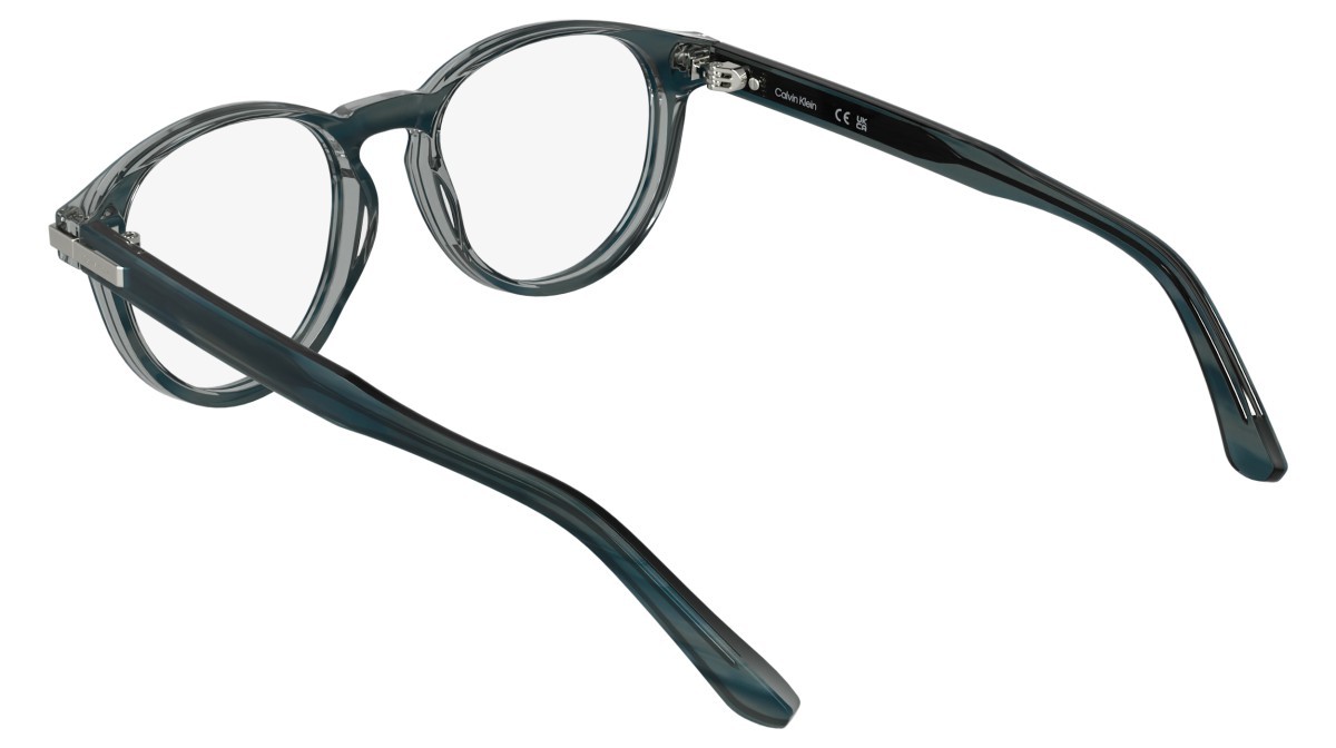 Eyeglasses Calvin Klein CK26513 (417) color transparent striped blue shape round 