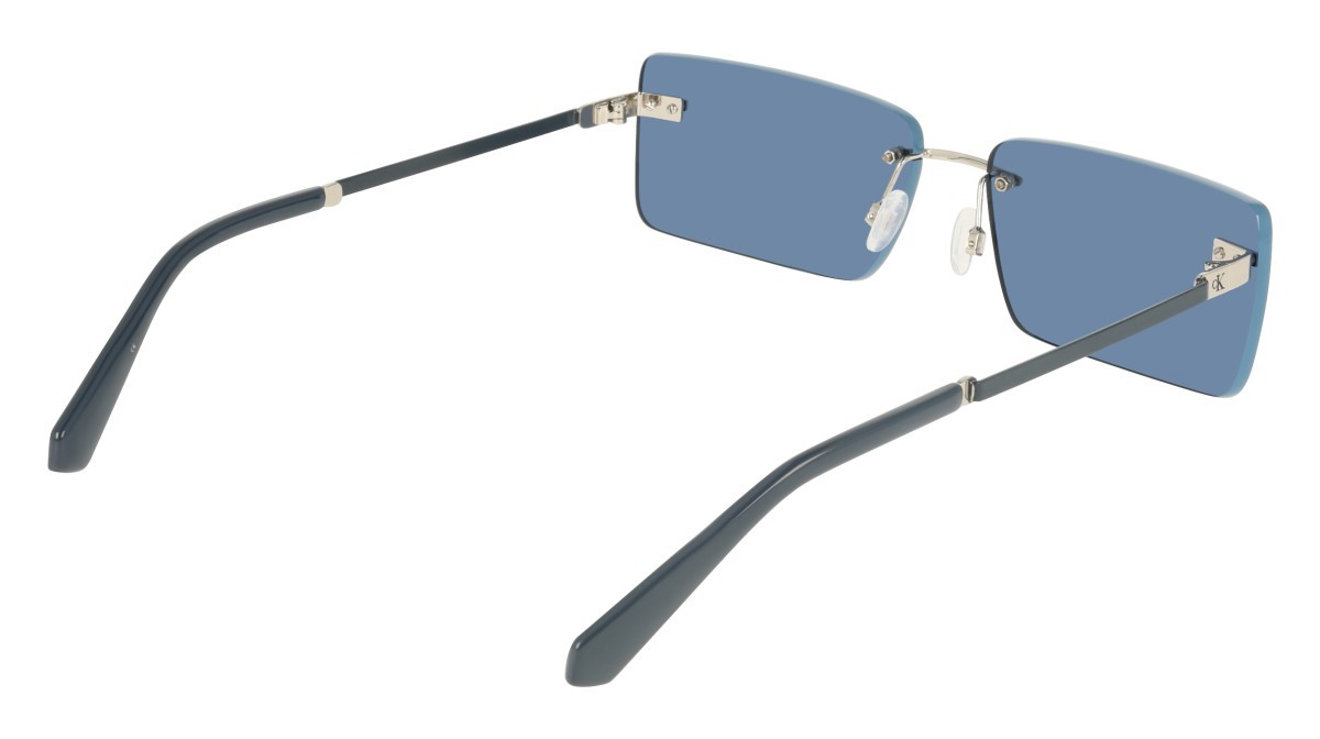 Occhiali da sole Calvin Klein Jeans CKJ25206S (044) colore silver/blue forma rettangolare lenti solid blue