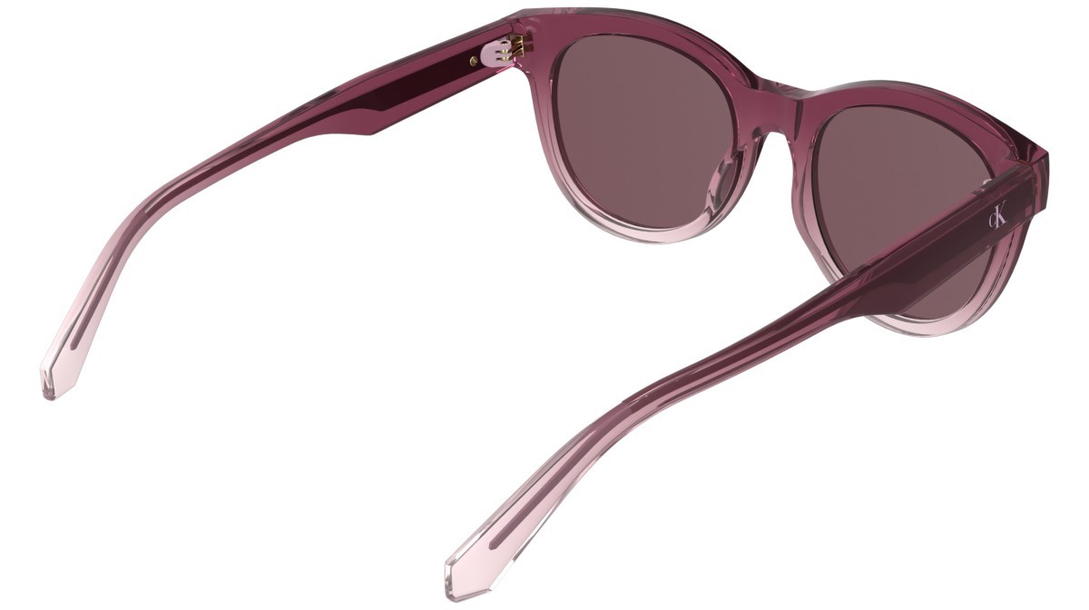 Occhiali da sole Calvin Klein Jeans CKJ26600S (606) colore transparent gradient wine/rose forma rotondo lenti solid wine