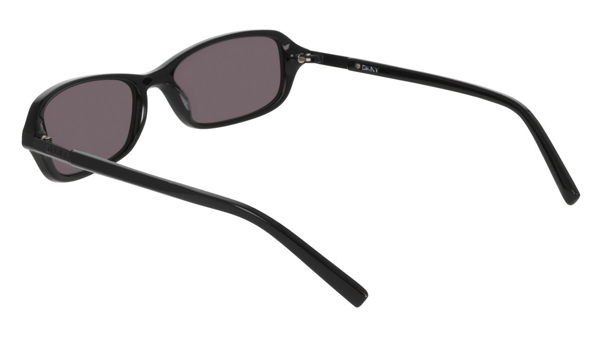 Sunglasses Dkny DK557S (001) color black shape rectangle lenses solid smtruee