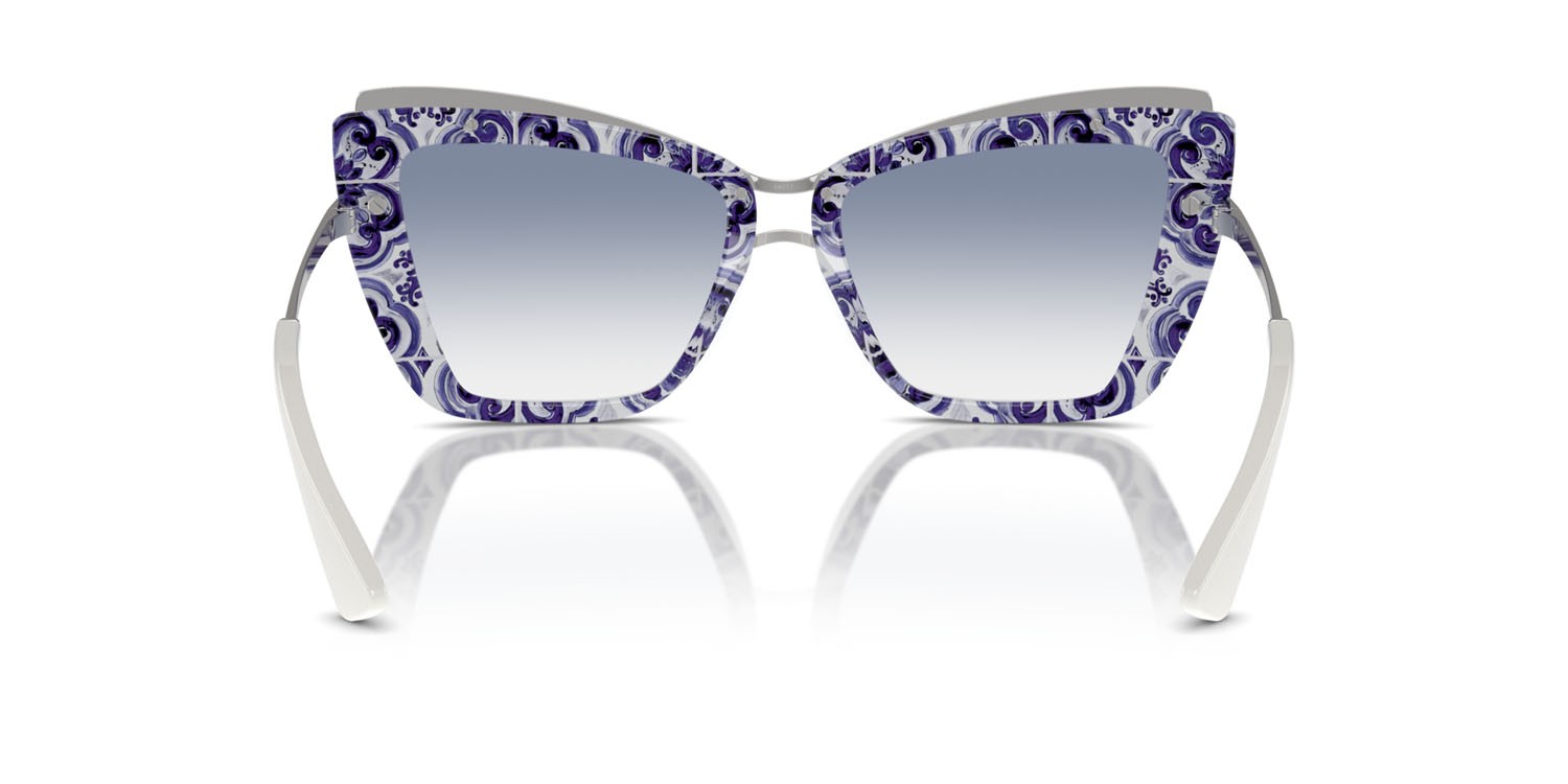 Occhiali da sole Dolce & Gabbana DG 4472 (337119) colore bianco su maiolica blu forma cat eye lenti trasparente sfumato azzurro