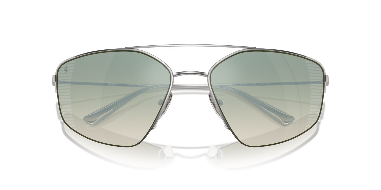 Occhiali da sole Ferrari FH 1009T (303/W0) colore argento forma irregolare lenti gradient green mirror