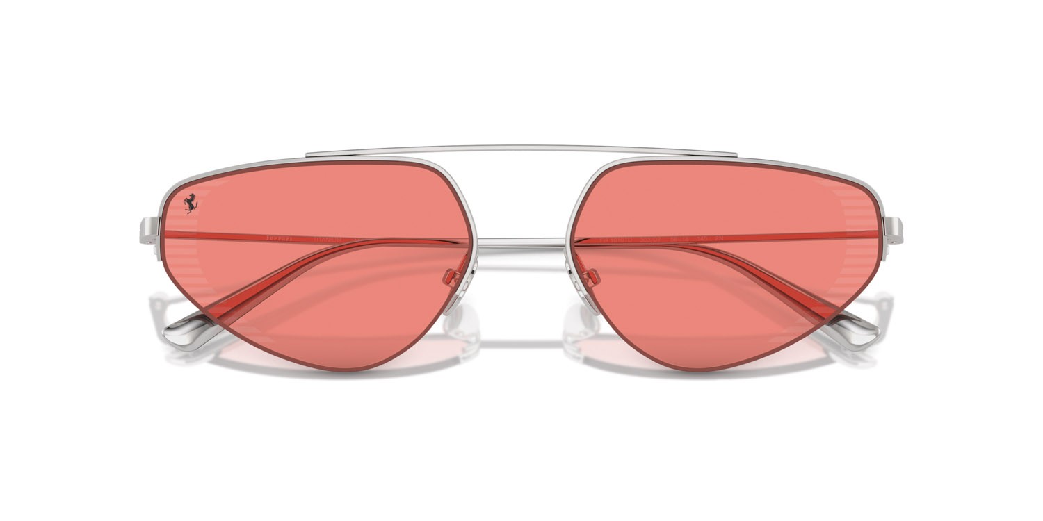 Occhiali da sole Ferrari FH 1010TD (303/D7) colore argento forma irregolare lenti rosso