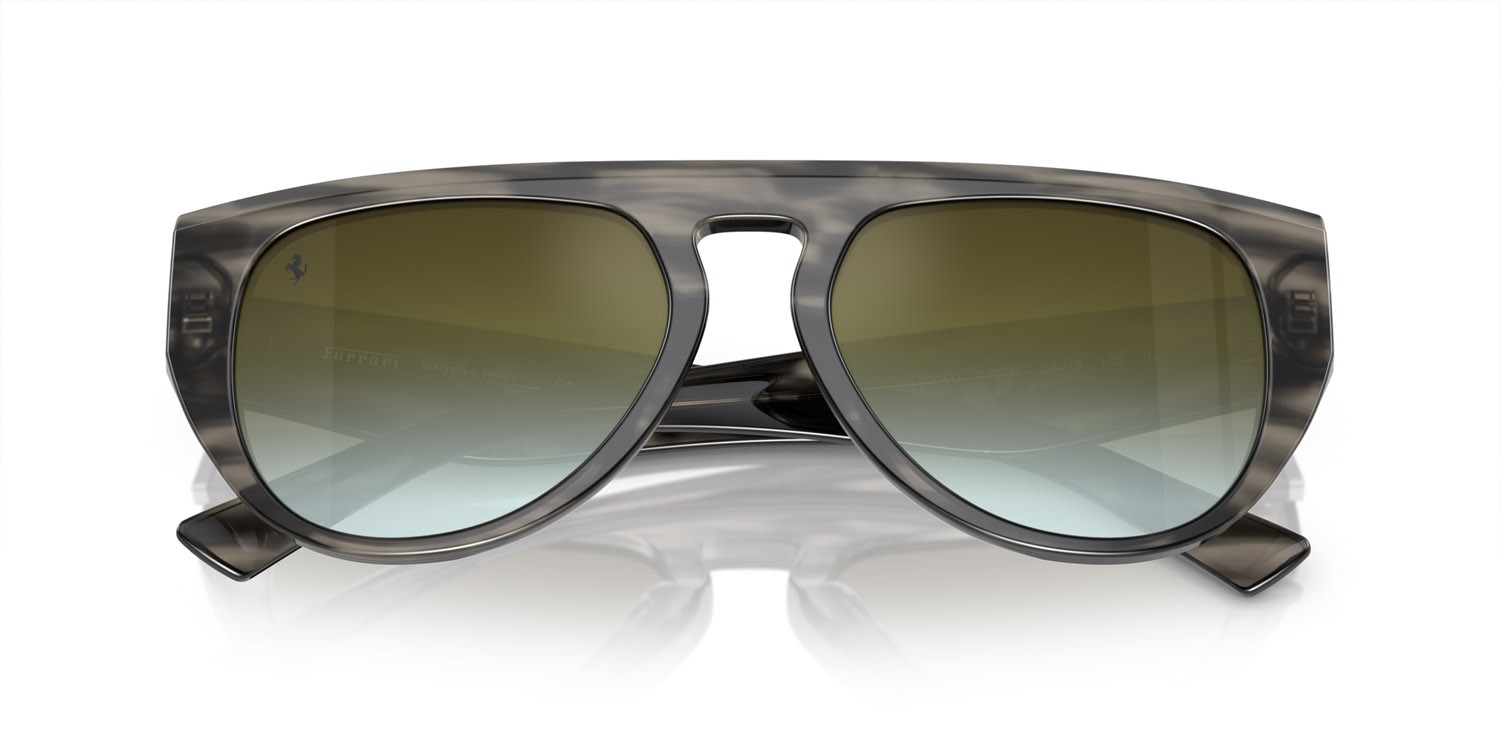 Occhiali da sole Ferrari FH 2005U (710/9J) colore striato grigio forma aviator lenti gradient green mirror