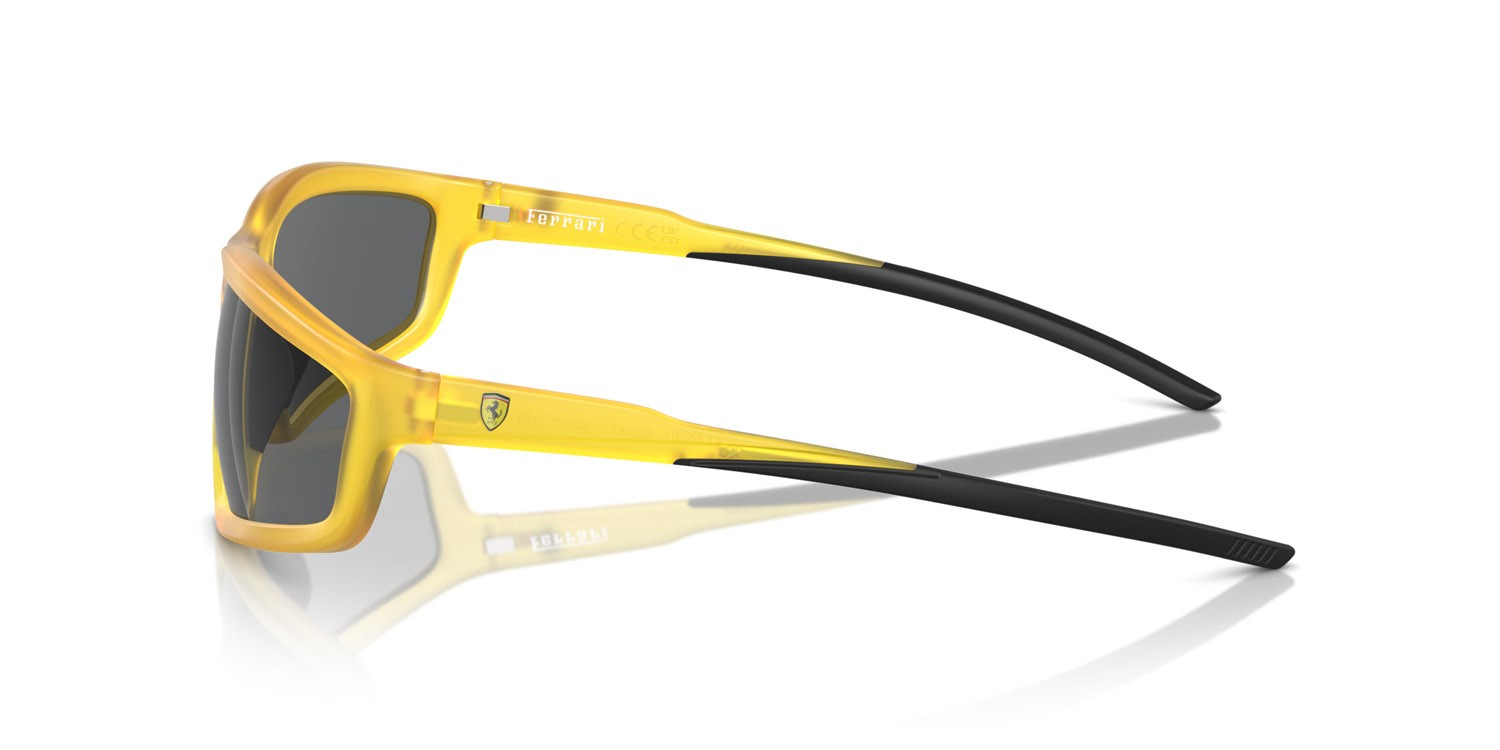 Occhiali da sole Ferrari Scuderia FZ 6007U (507/87) colore yellow opal matte forma irregolare lenti grigio