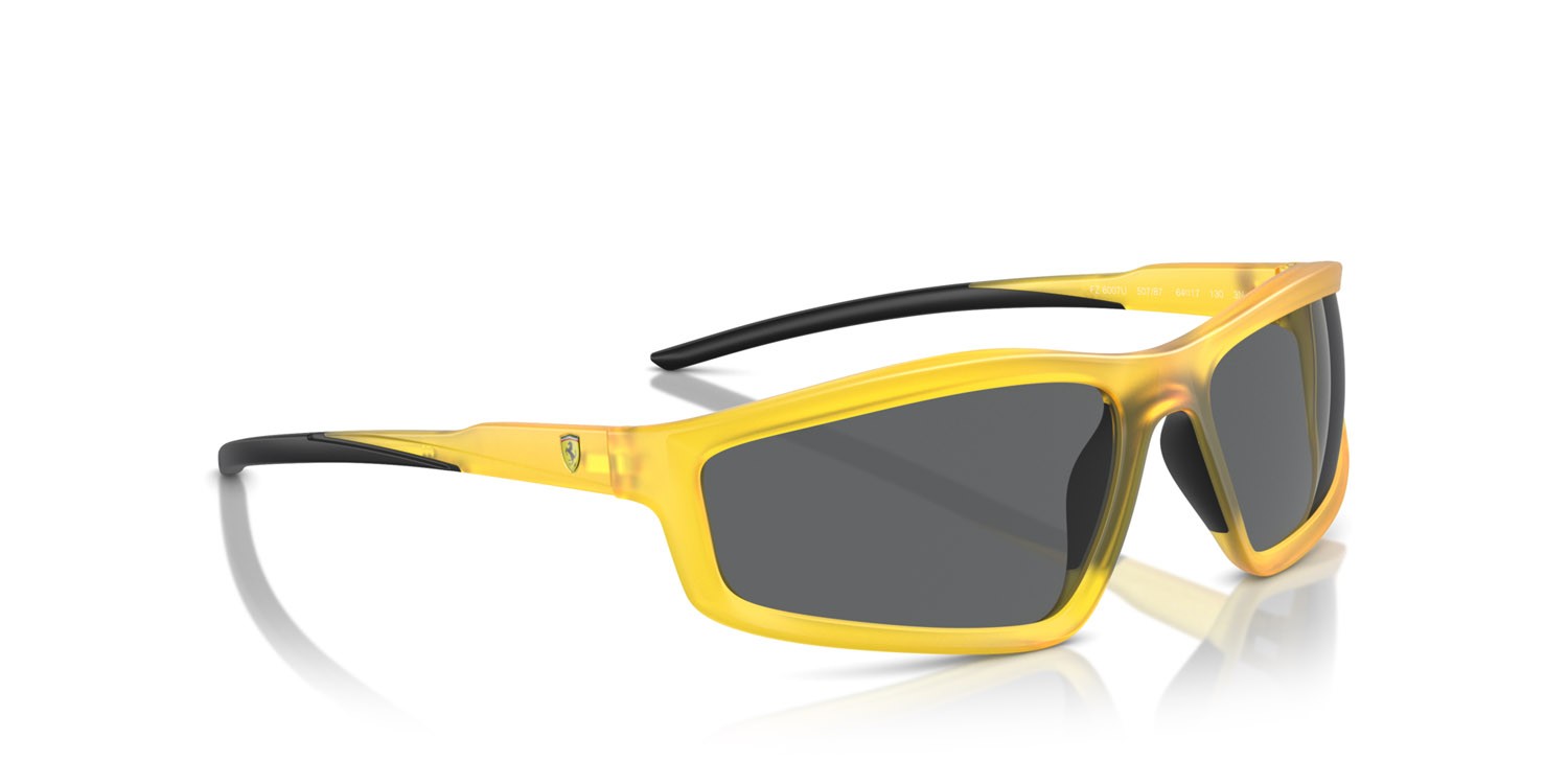 Occhiali da sole Ferrari Scuderia FZ 6007U (507/87) colore yellow opal matte forma irregolare lenti grigio