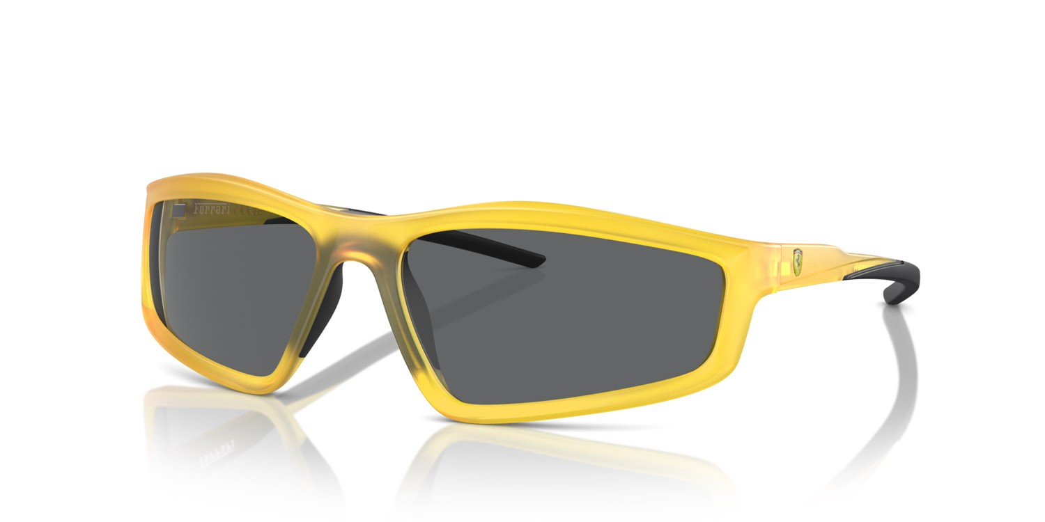 Occhiali da sole Ferrari Scuderia FZ 6007U (507/87) colore yellow opal matte forma irregolare lenti grigio