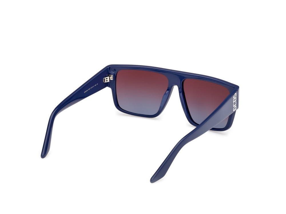 Occhiali da sole GCDS GD0063 (90T) colore blu lucido forma geometrico lenti bordeaux sfumato