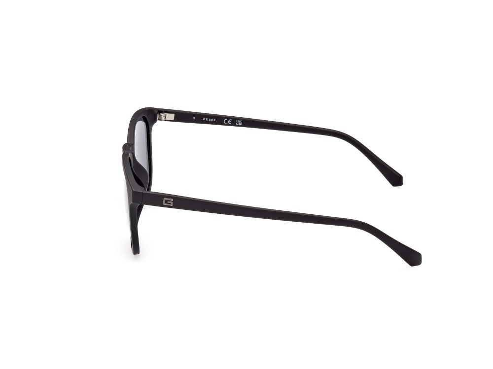Occhiali da sole Guess GU00061 (02D) colore nero opaco forma rotondo lenti fumo polar.