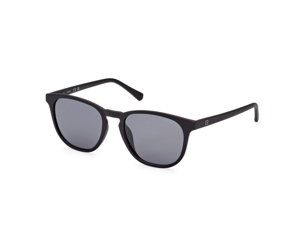 Occhiali da sole Guess GU00061 (02D) colore nero opaco forma rotondo lenti fumo polar.