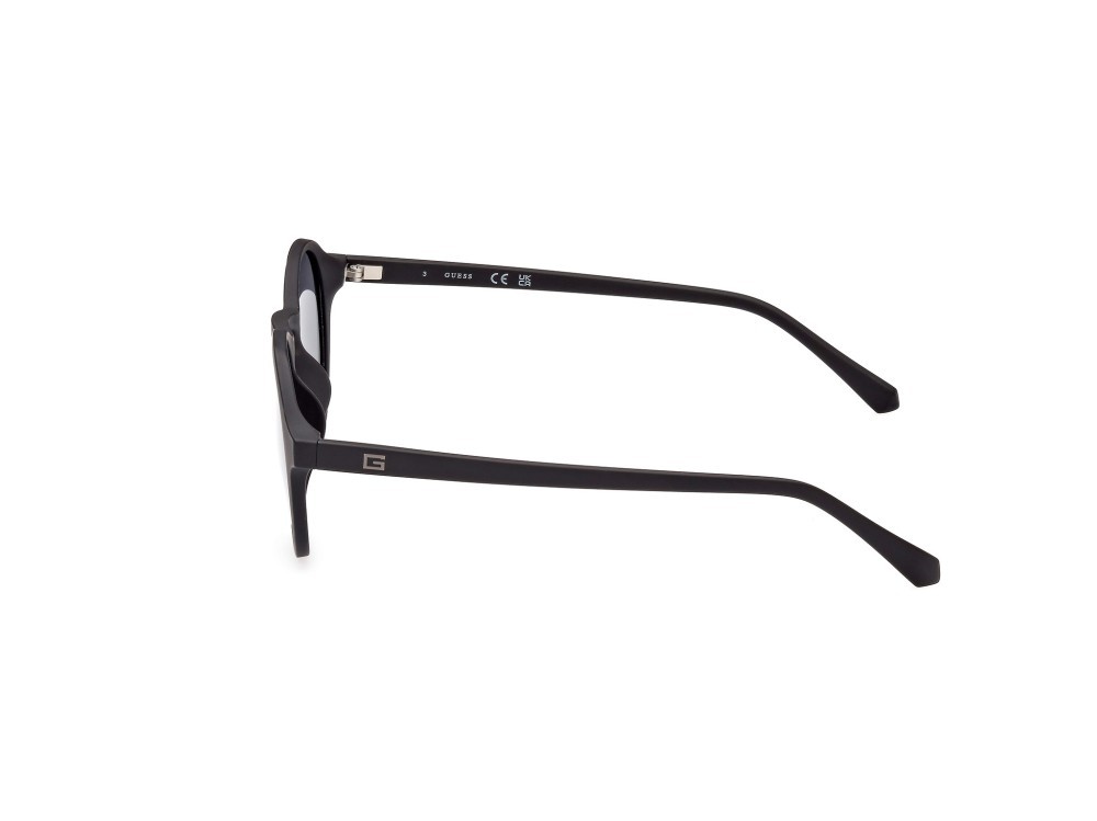 Occhiali da sole Guess GU00062 (02D) colore nero opaco forma rotondo lenti fumo polar.