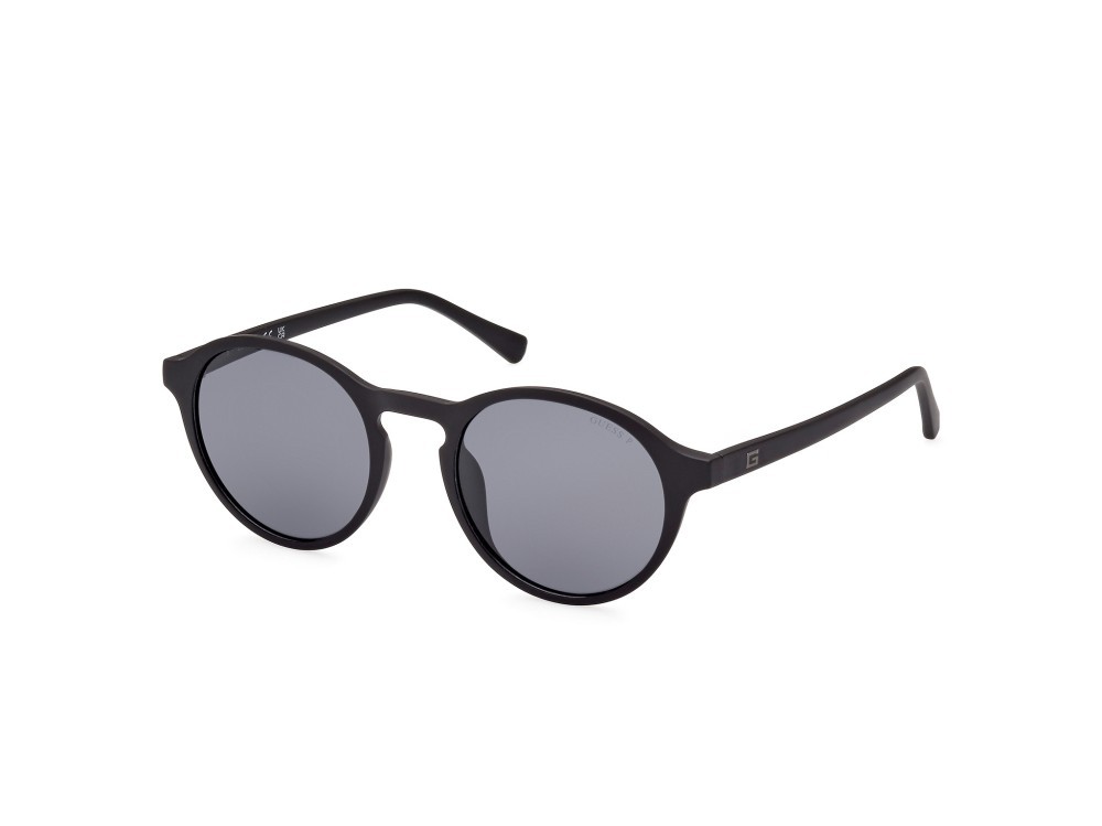 Occhiali da sole Guess GU00062 (02D) colore nero opaco forma rotondo lenti fumo polar.