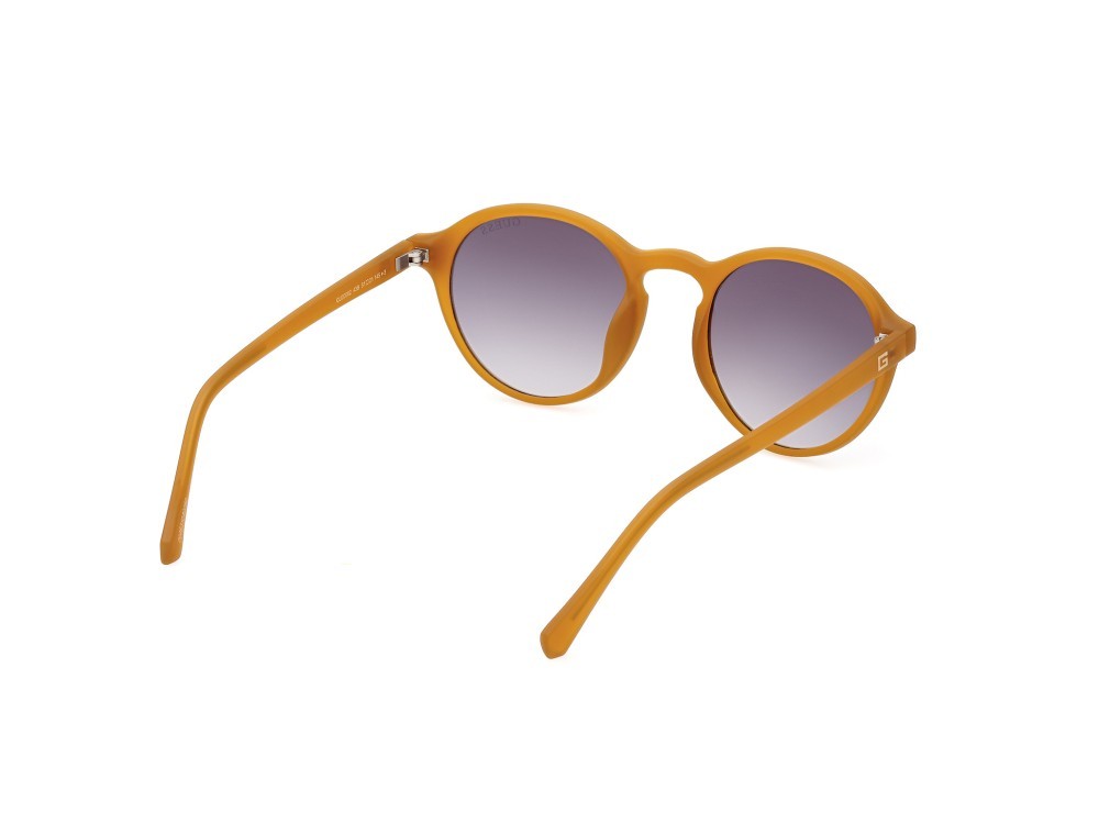 Occhiali da sole Guess GU00062 (43B) colore arancio opaco forma rotondo lenti fumo grad.