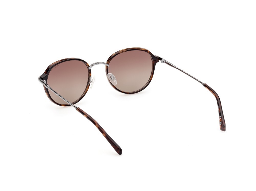 Occhiali da sole Guess GU00068 (52H) colore avana scura forma rotondo lenti marrone polar.