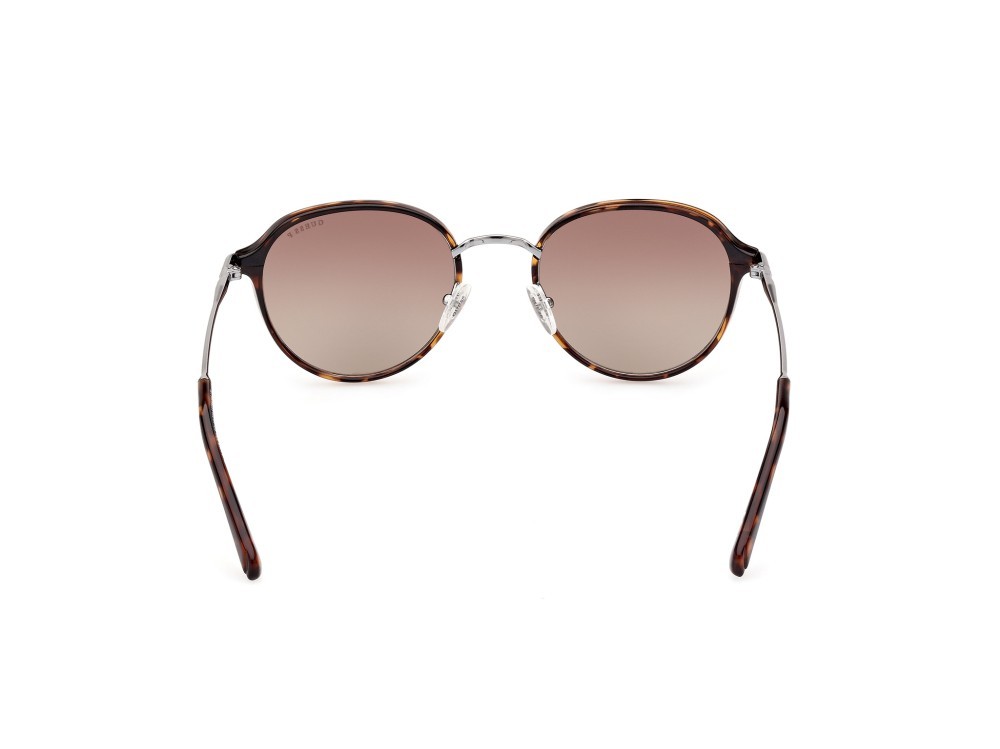 Occhiali da sole Guess GU00068 (52H) colore avana scura forma rotondo lenti marrone polar.