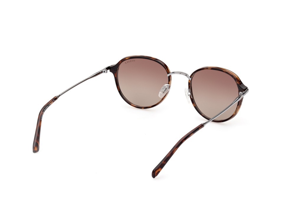 Occhiali da sole Guess GU00068 (52H) colore avana scura forma rotondo lenti marrone polar.