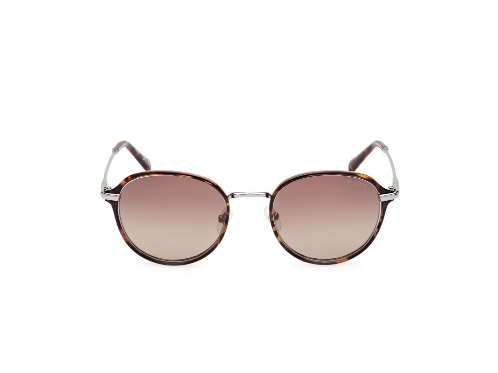 Occhiali da sole Guess GU00068 (52H) colore avana scura forma rotondo lenti marrone polar.